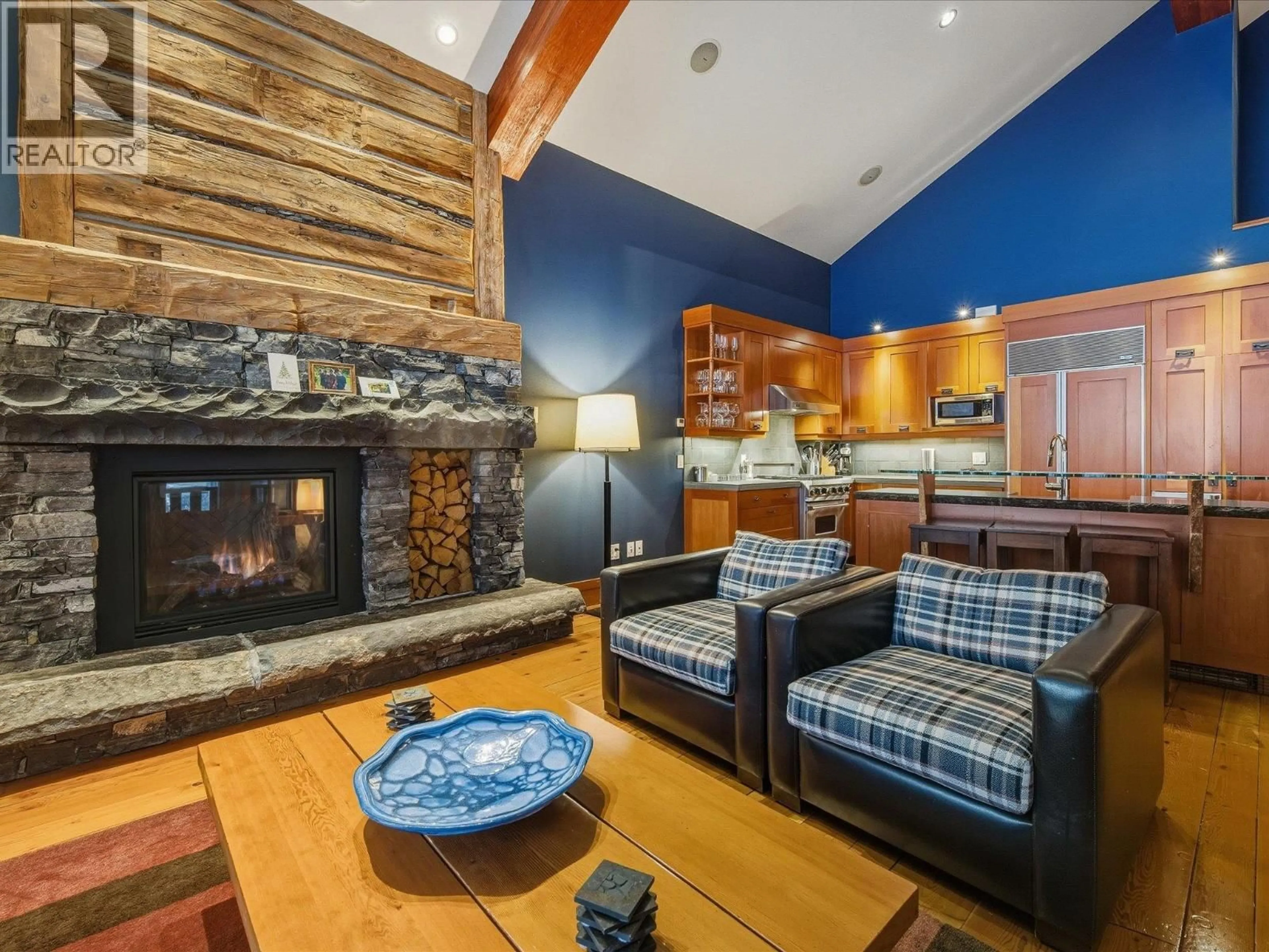 Living room with furniture, wood/laminate floor for 10J - 2300 NORDIC DRIVE, Whistler British Columbia V8E0A6