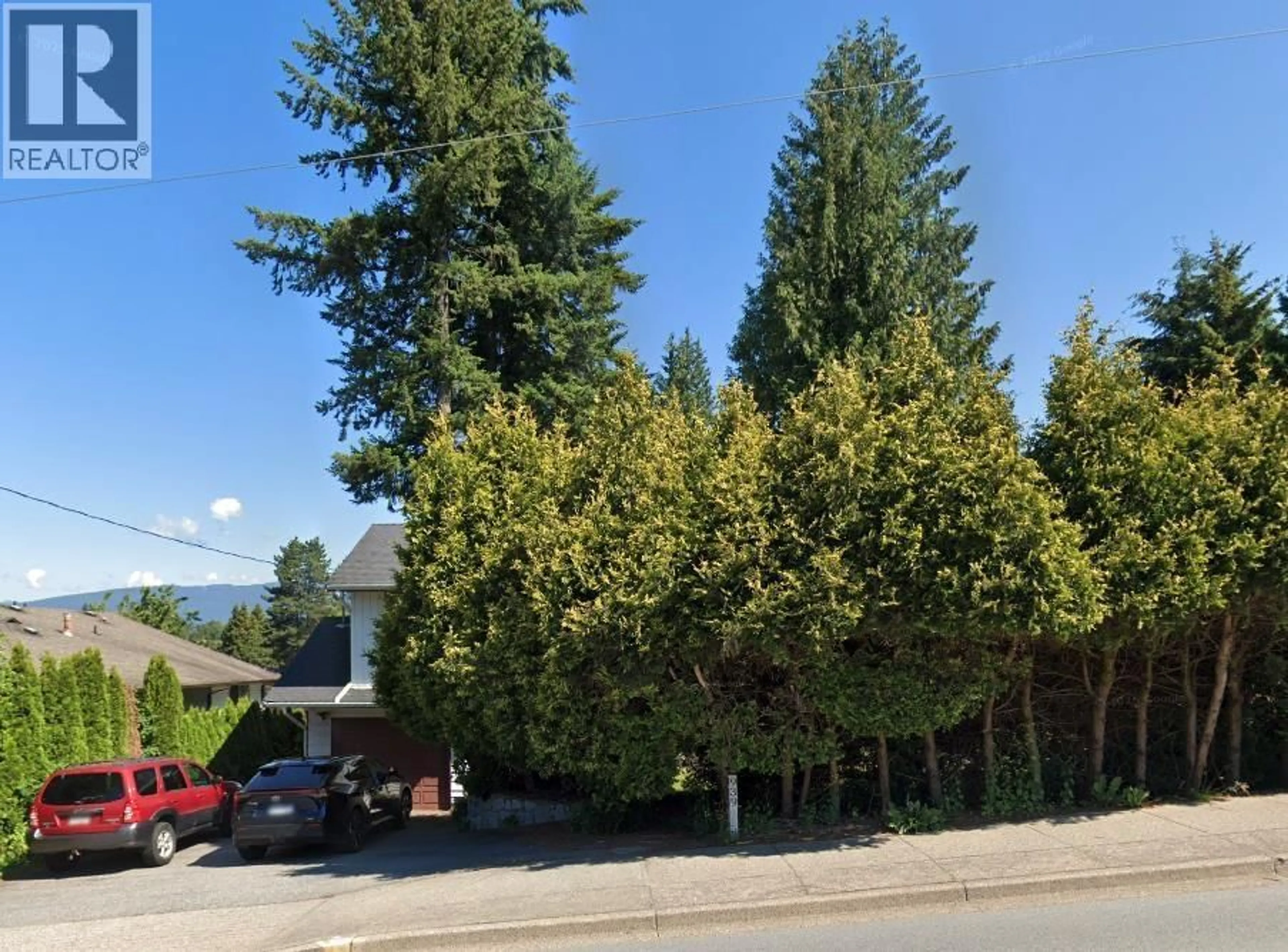 A pic from outside/outdoor area/front of a property/back of a property/a pic from drone, forest/trees view for 939 COMO LAKE AVENUE, Coquitlam British Columbia V3J3N2