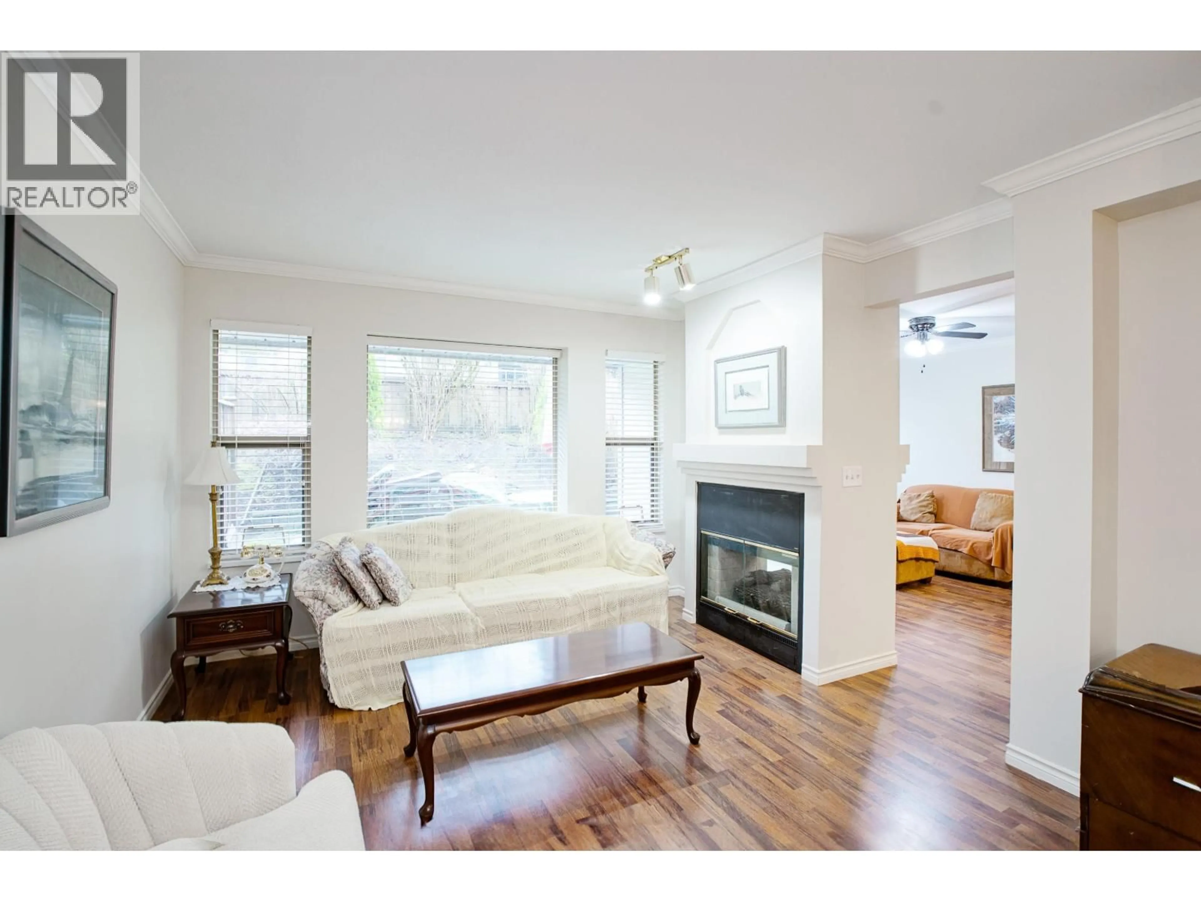 Living room with furniture, wood/laminate floor for 43 - 22280 124TH AVENUE AVENUE, Maple Ridge British Columbia V2X4J5