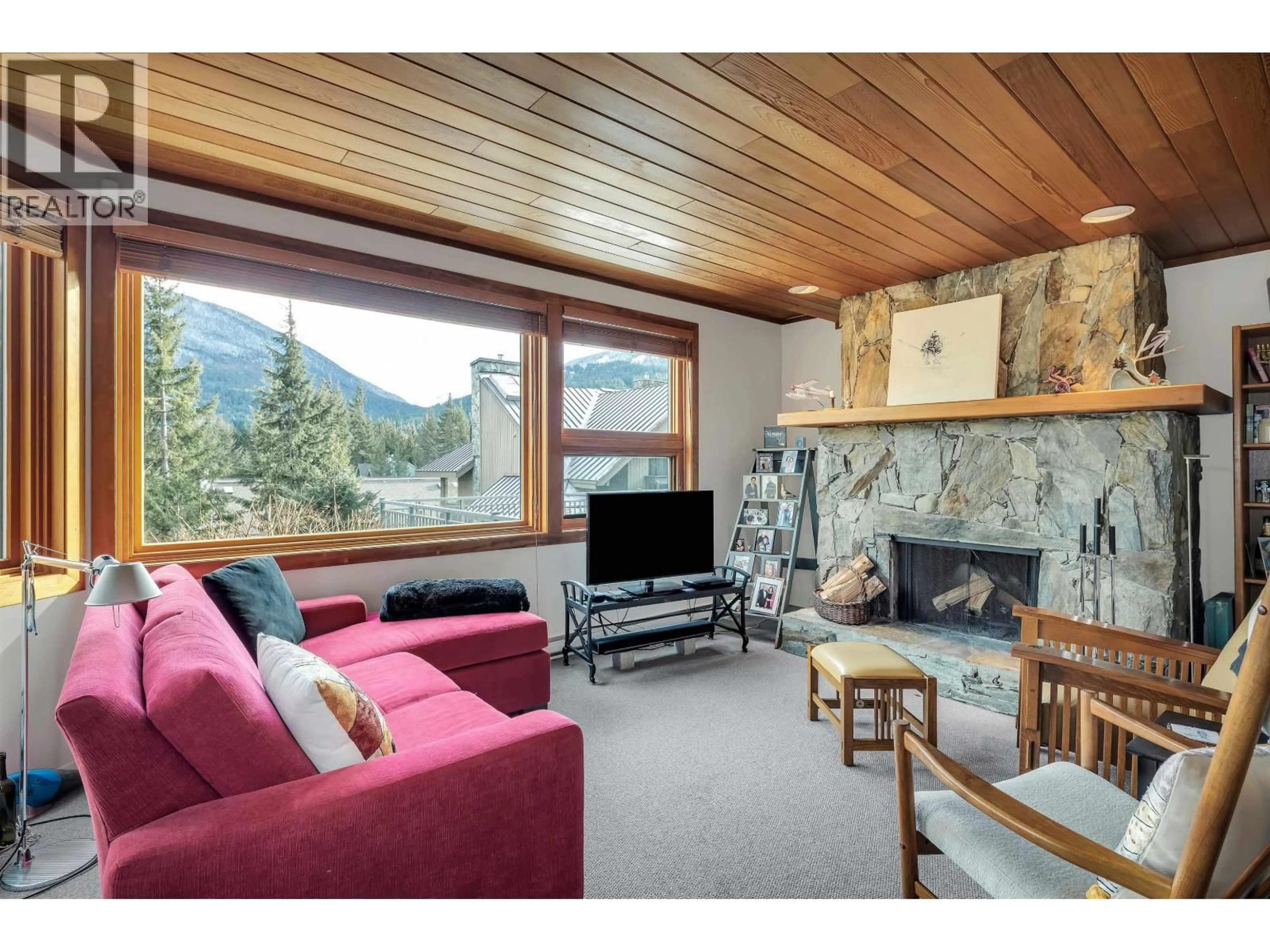 Living room with furniture, wood/laminate floor for 109 - 6117 EAGLE DRIVE, Whistler British Columbia V8E0E1