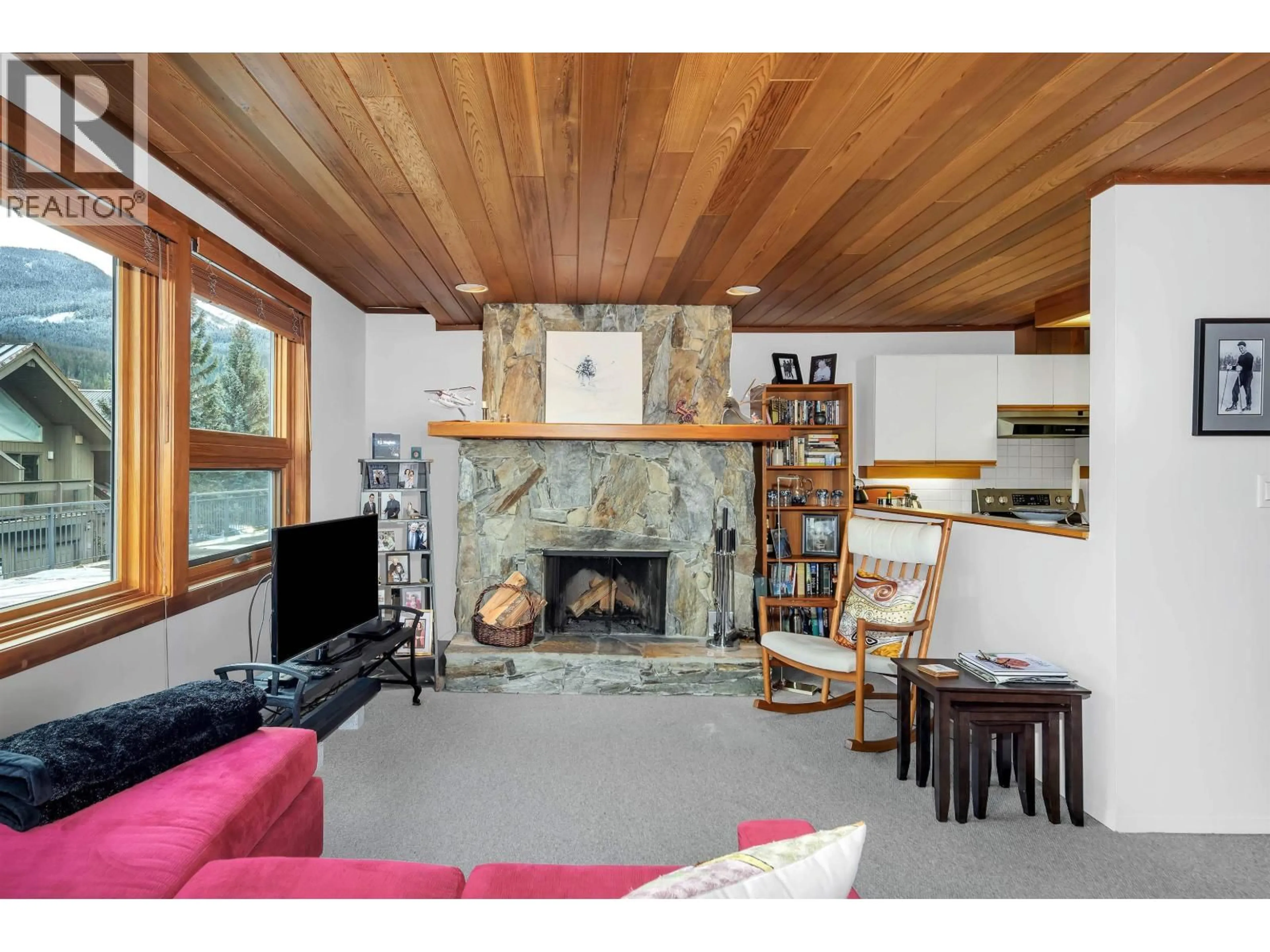 Living room with furniture, wood/laminate floor for 109 - 6117 EAGLE DRIVE, Whistler British Columbia V8E0E1