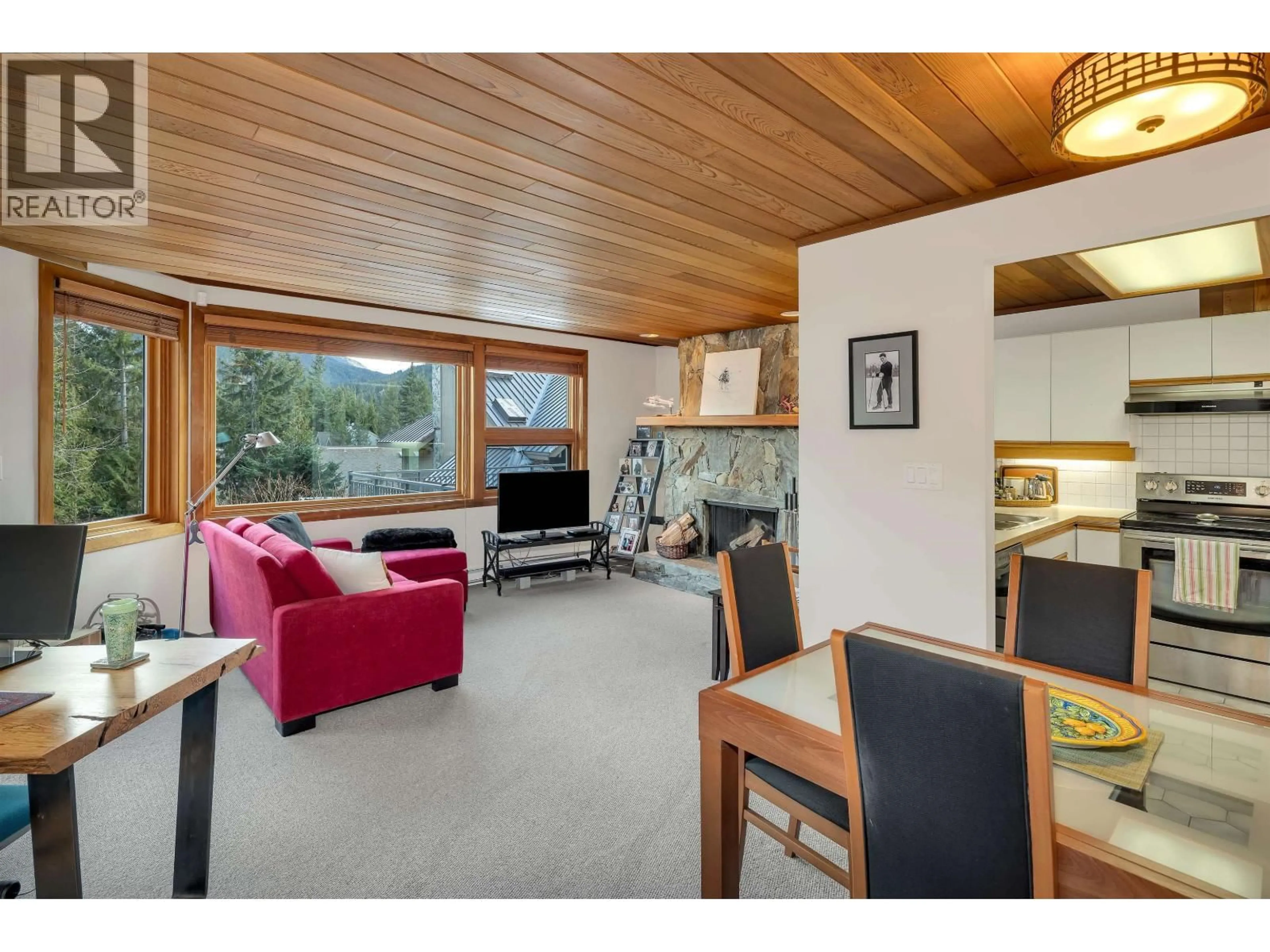 Living room with furniture, wood/laminate floor for 109 - 6117 EAGLE DRIVE, Whistler British Columbia V8E0E1