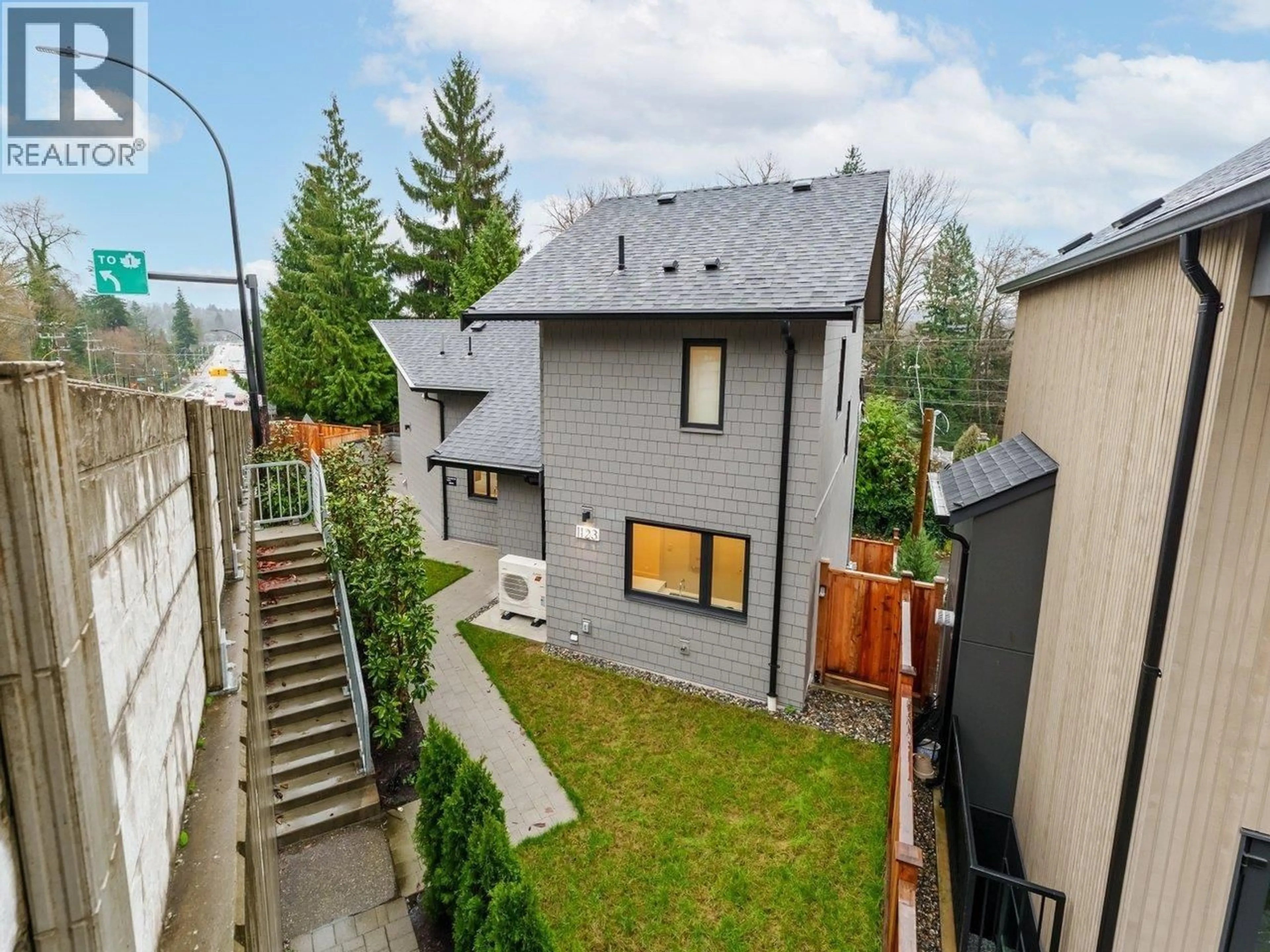 A pic from outside/outdoor area/front of a property/back of a property/a pic from drone, unknown for 1123 KEITH ROAD, North Vancouver British Columbia V7L1X4