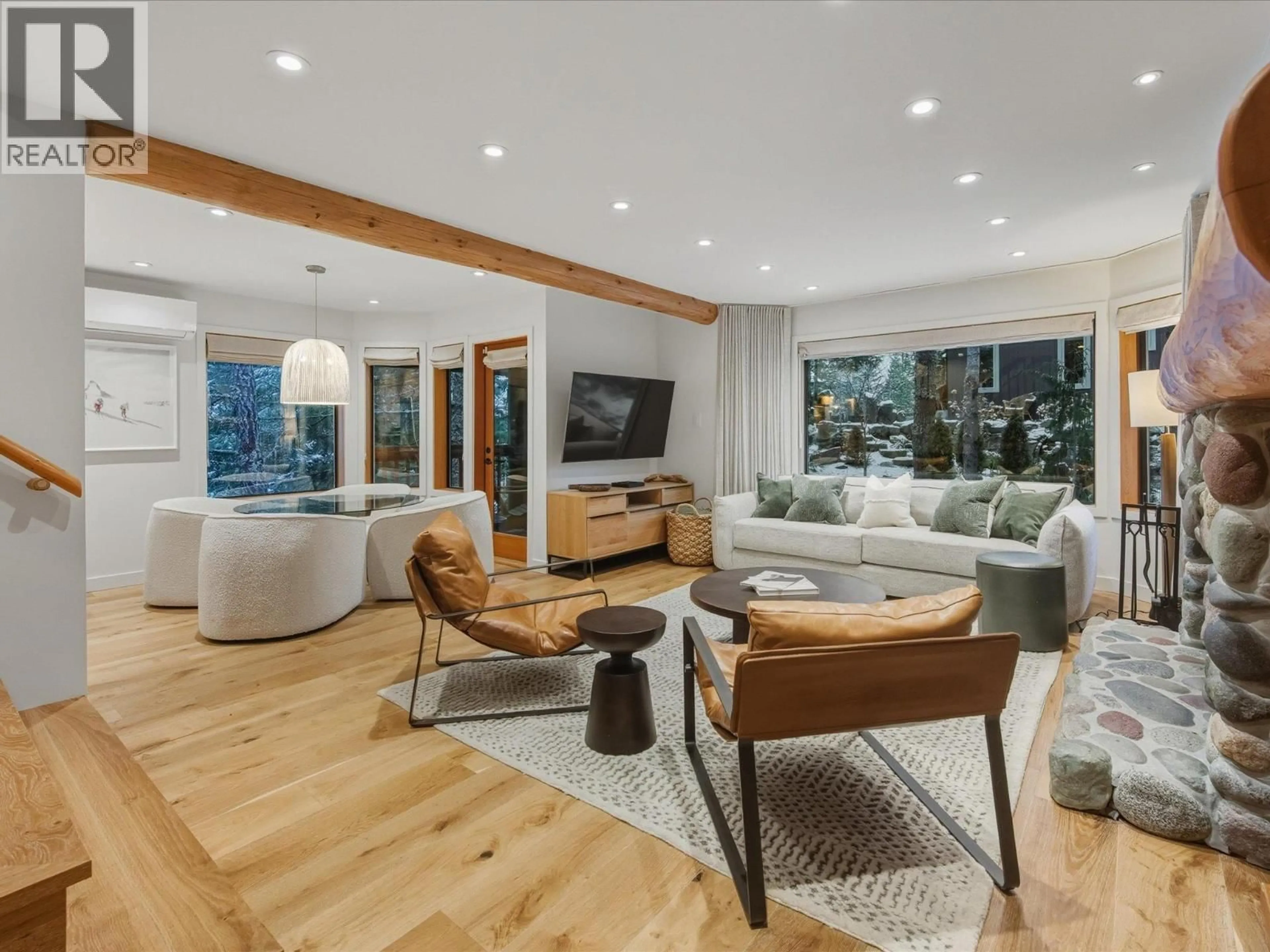 Living room with furniture, wood/laminate floor for 2315 GONDOLA WAY, Whistler British Columbia V8E0N2