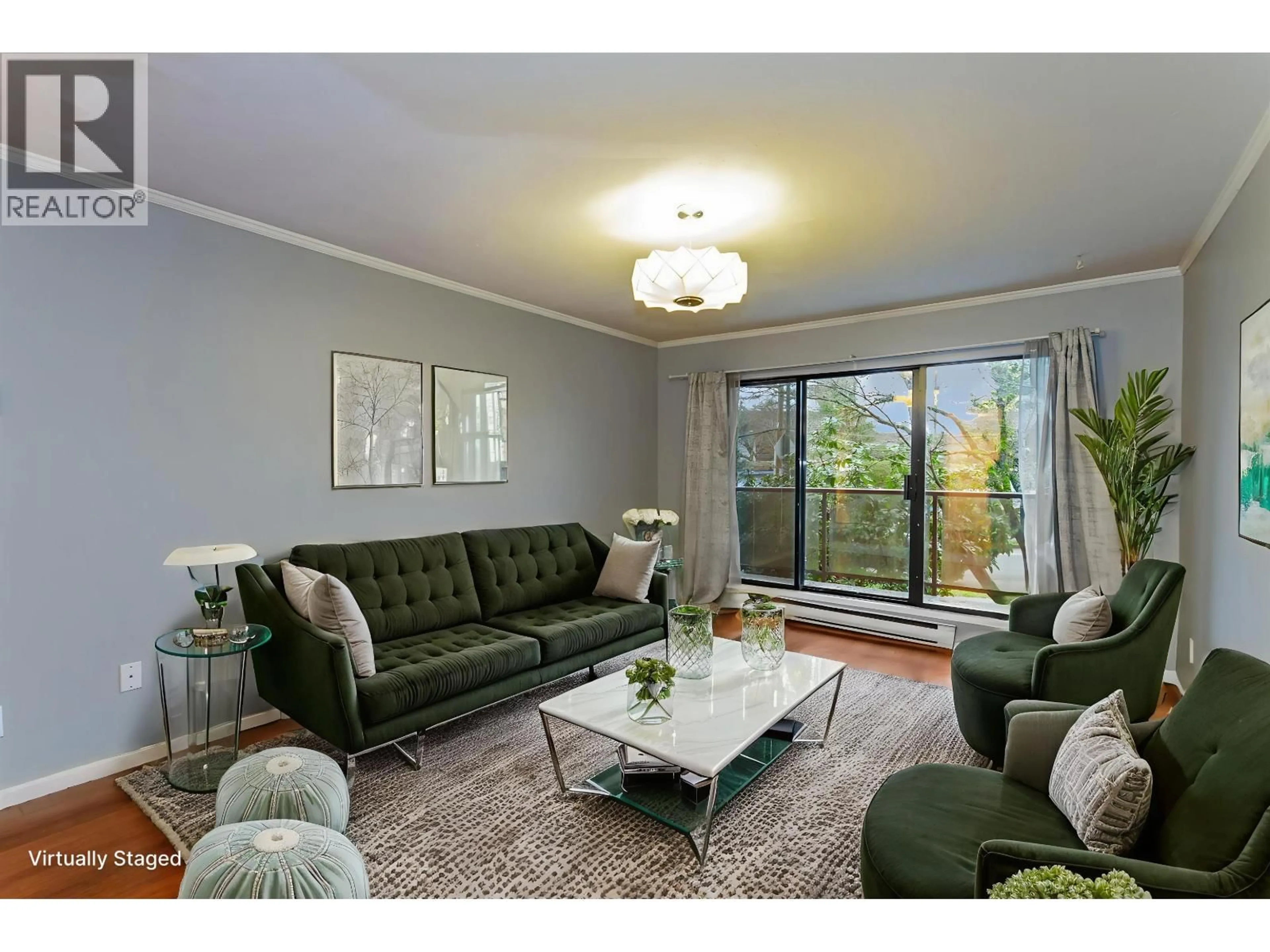 Living room with furniture, wood/laminate floor for 201 - 2222 PRINCE EDWARD STREET, Vancouver British Columbia V5T4M6