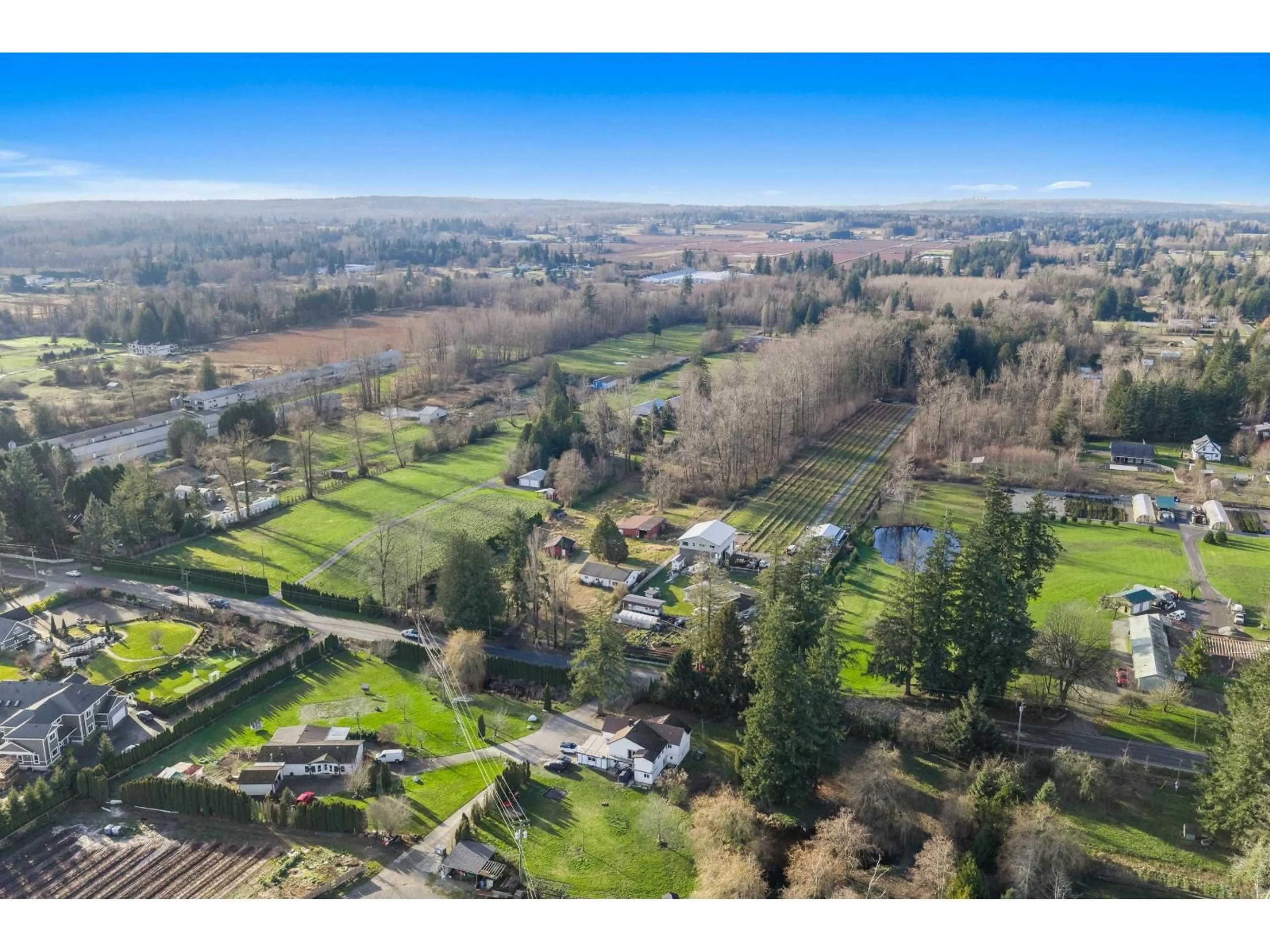 A pic from outside/outdoor area/front of a property/back of a property/a pic from drone, mountain view for 2271 240 STREET, Langley British Columbia V2Z3A4