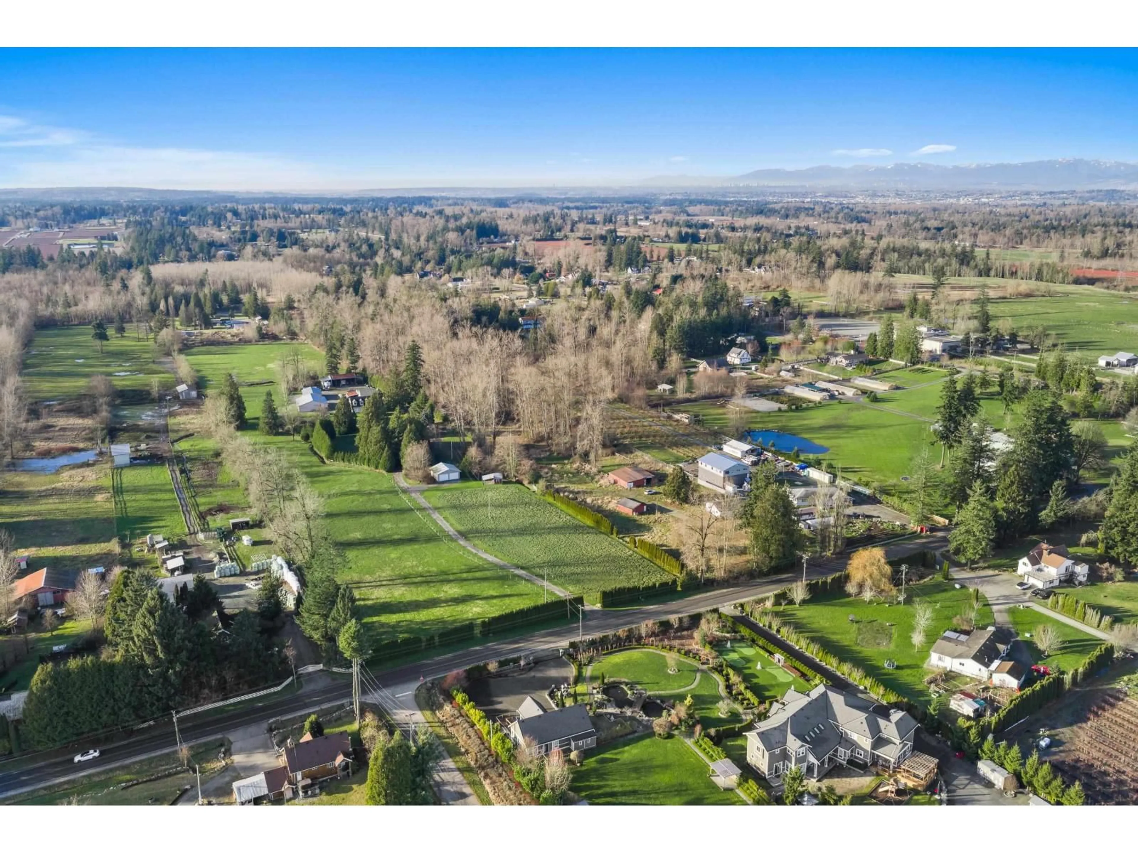 A pic from outside/outdoor area/front of a property/back of a property/a pic from drone, mountain view for 2271 240 STREET, Langley British Columbia V2Z3A4