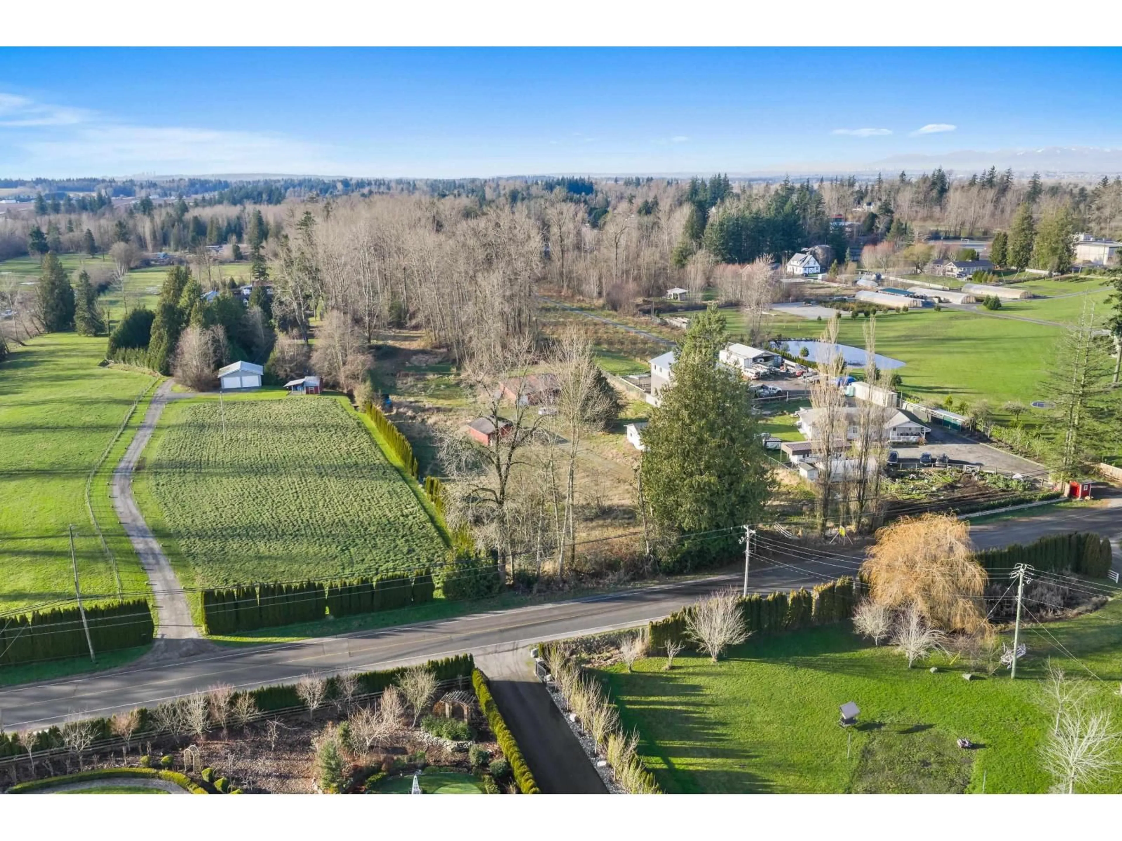 A pic from outside/outdoor area/front of a property/back of a property/a pic from drone, mountain view for 2271 240 STREET, Langley British Columbia V2Z3A4