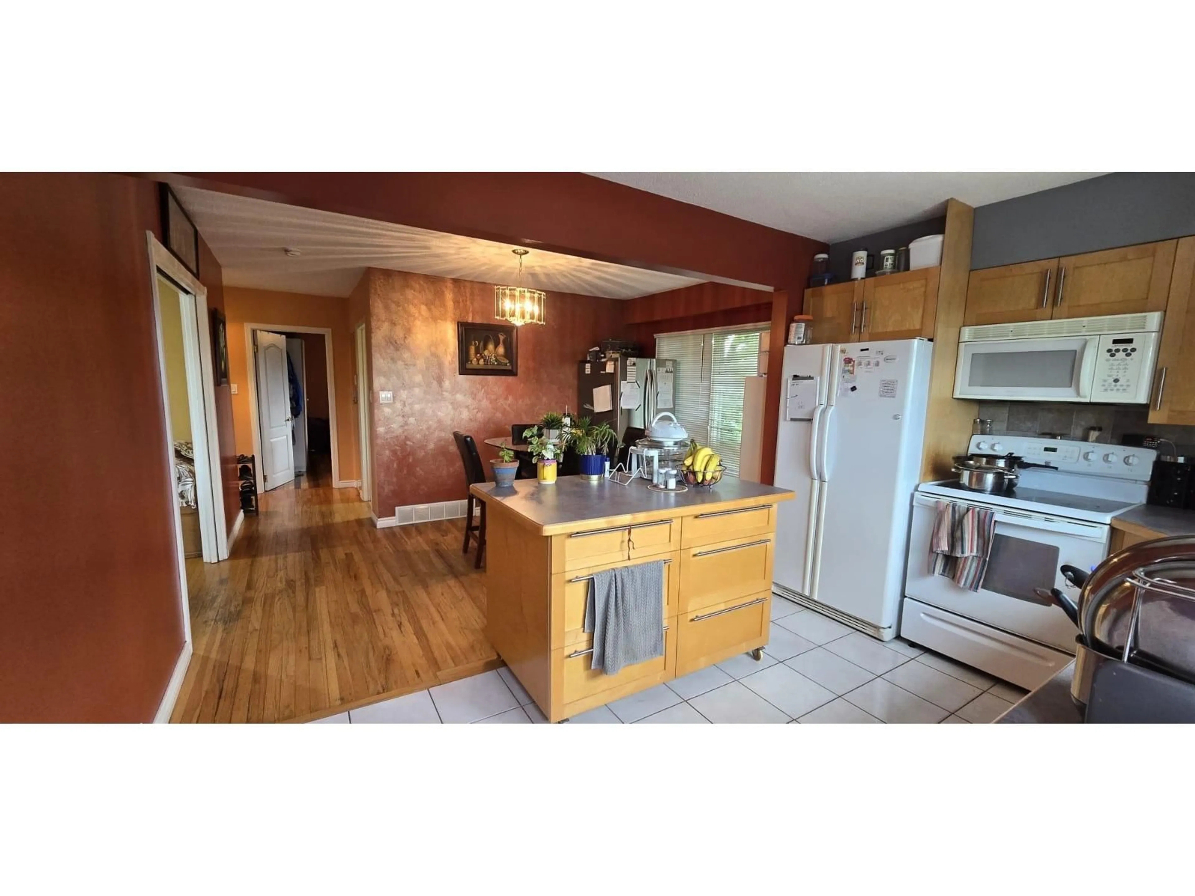 Open concept kitchen, wood/laminate floor for 11475 139A STREET, Surrey British Columbia V6X3L6