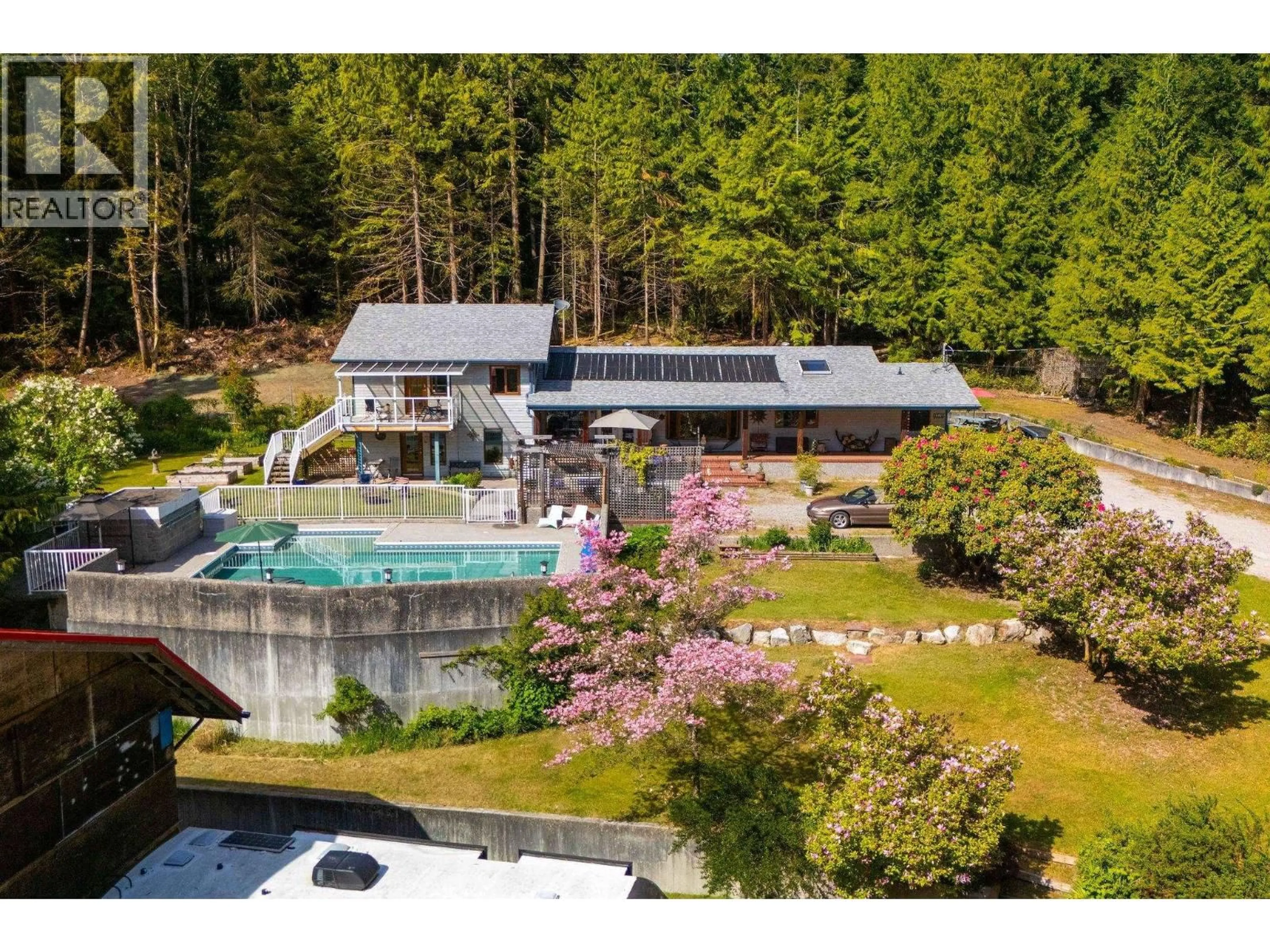 A pic from outside/outdoor area/front of a property/back of a property/a pic from drone, water/lake/river/ocean view for 3318-42 LINWOOD ROAD, Roberts Creek British Columbia V0N2W1