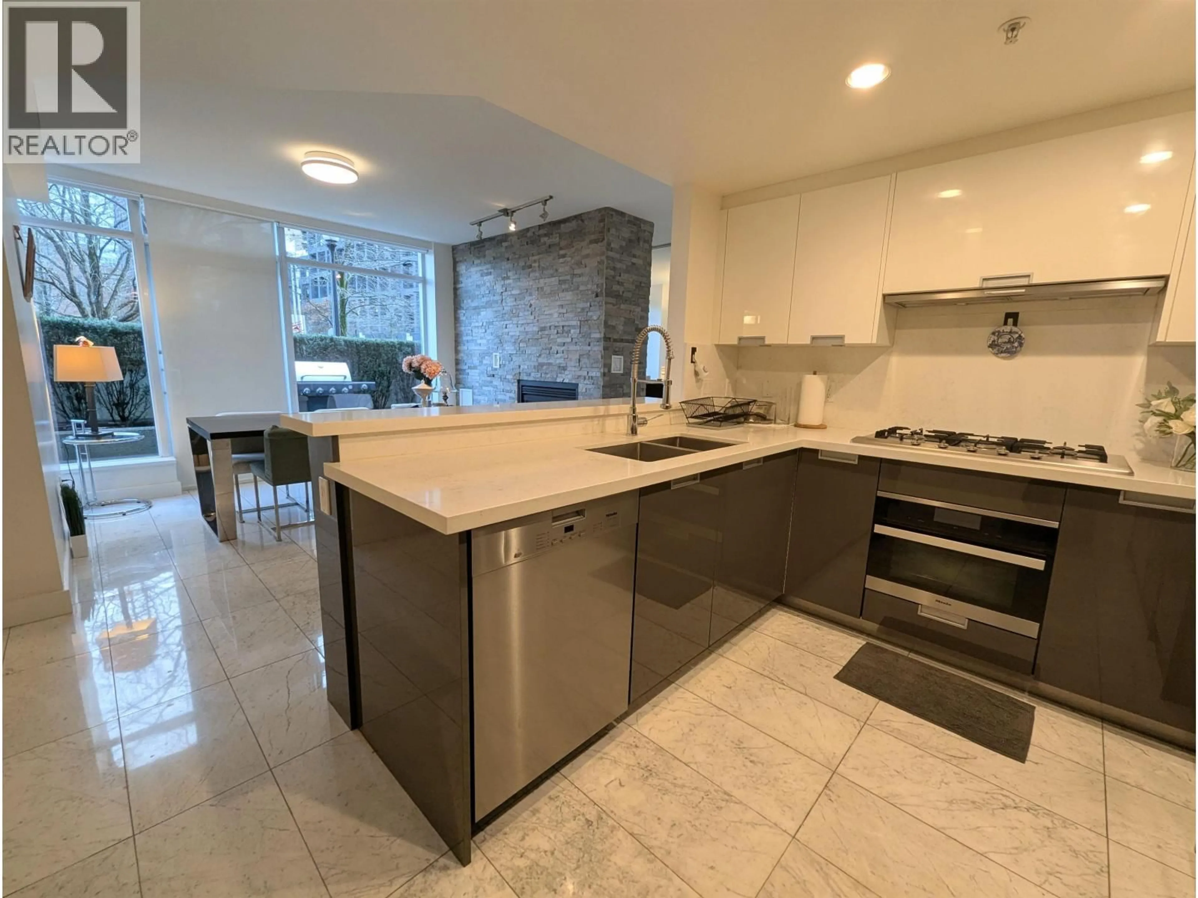Open concept kitchen, ceramic/tile floor for 1211 CORDOVA, Vancouver British Columbia V6C3P9