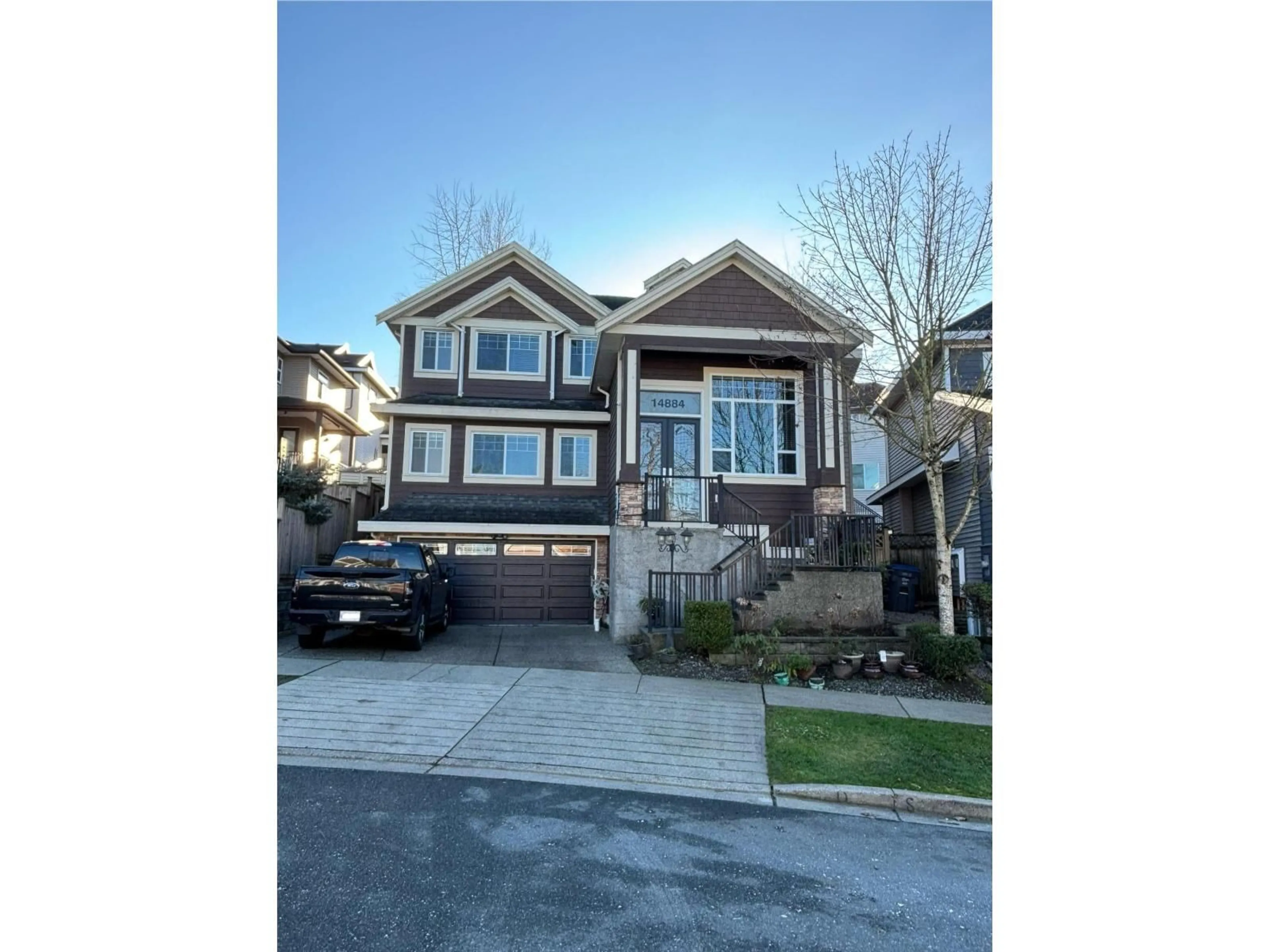Home with vinyl exterior material, street for 14884 63 AVENUE, Surrey British Columbia V3S2W9