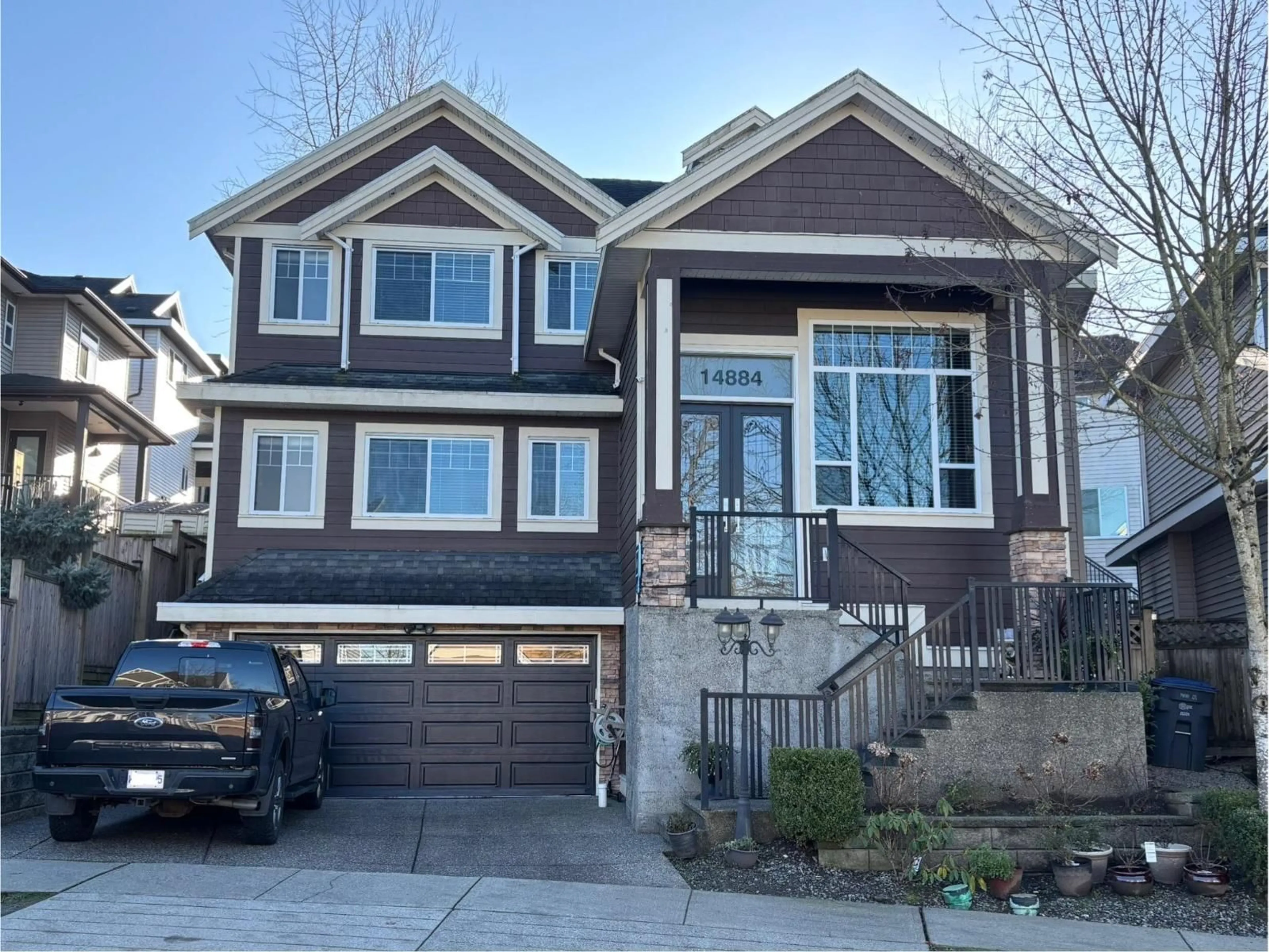 Home with vinyl exterior material, street for 14884 63 AVENUE, Surrey British Columbia V3S2W9