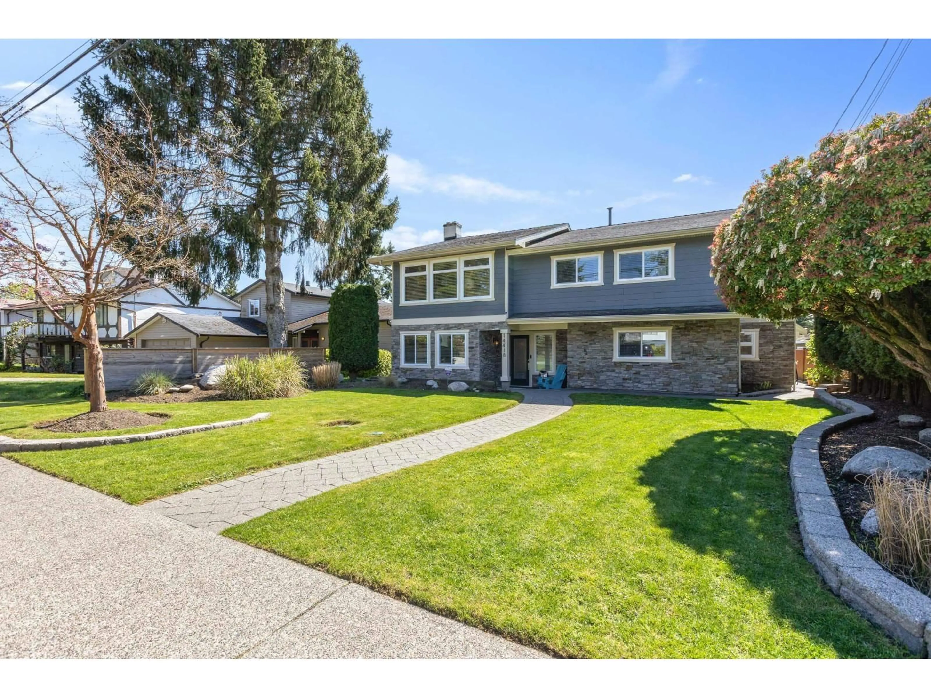 Home with vinyl exterior material, street for 14418 16A AVENUE, Surrey British Columbia V4A5T8