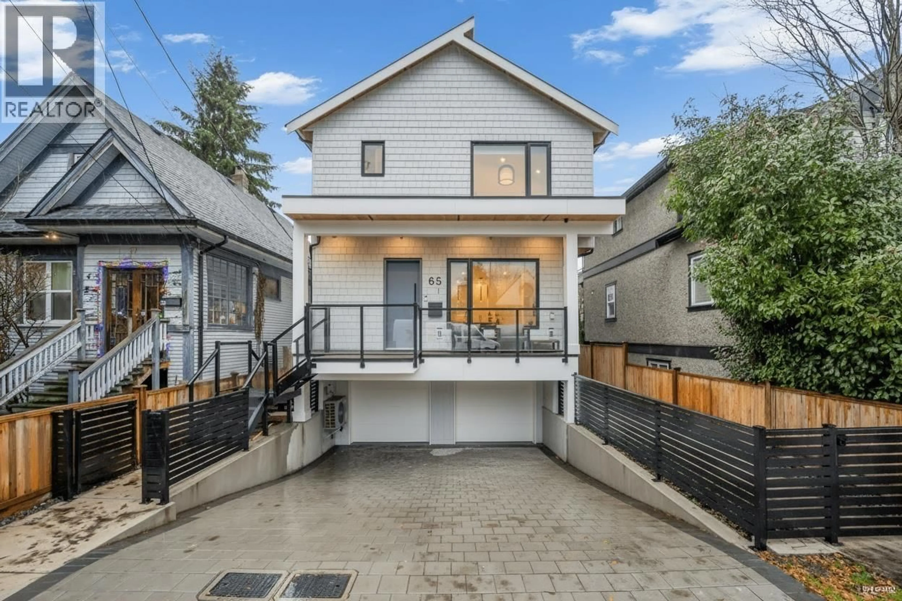 Home with vinyl exterior material, street for 1 - 65 KING EDWARD AVENUE, Vancouver British Columbia V5V2B8