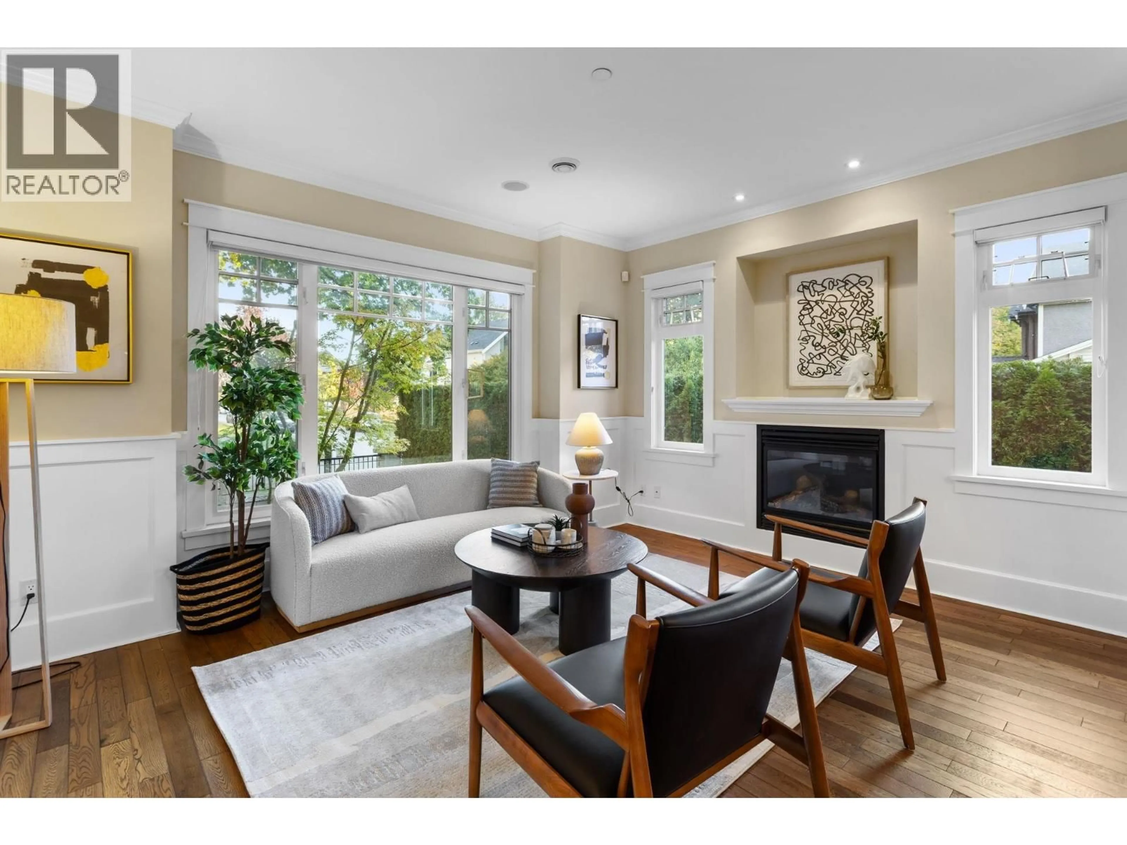 Living room with furniture, wood/laminate floor for 3895 23RD AVENUE, Vancouver British Columbia V6S1K8