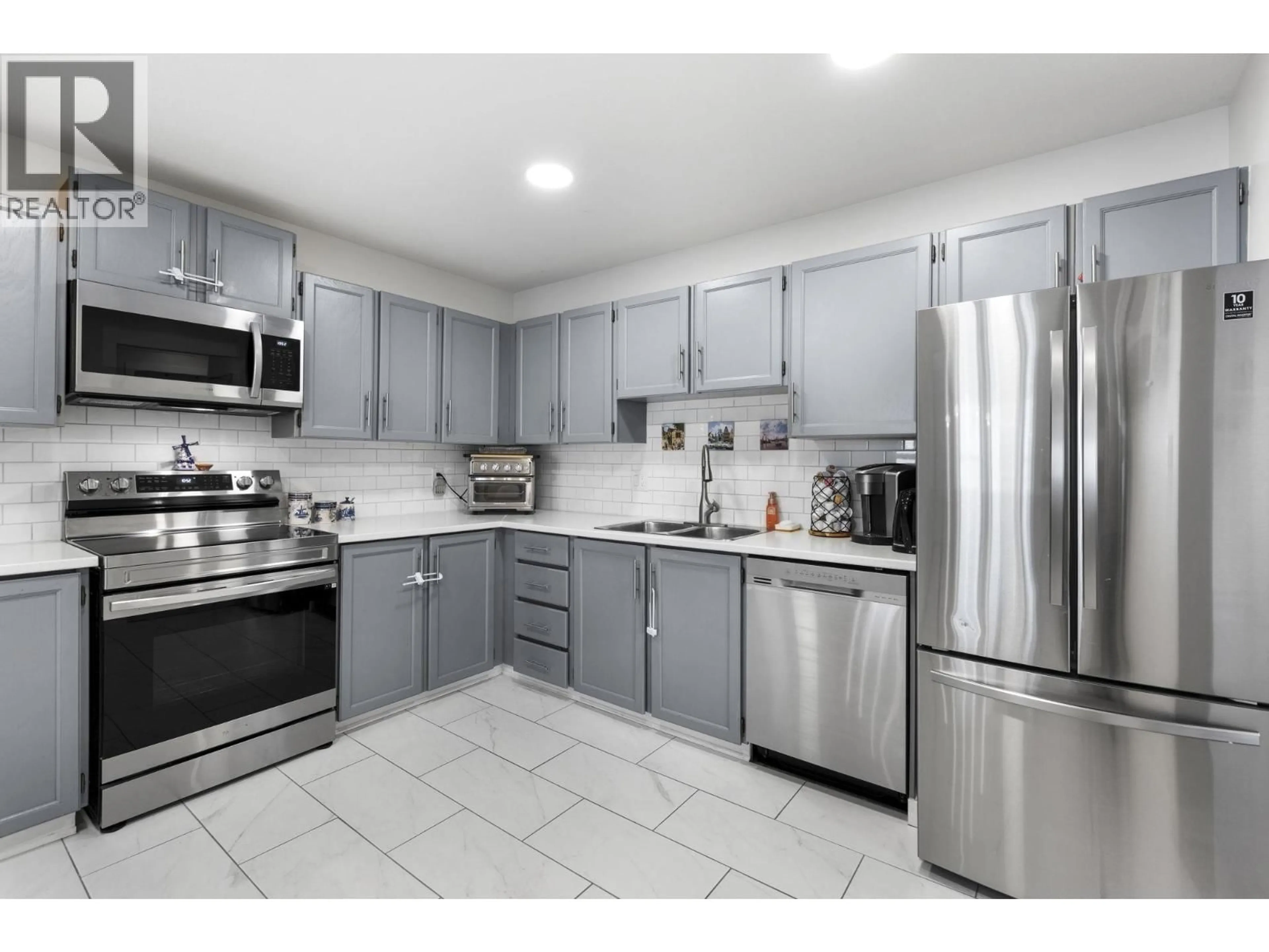 Standard kitchen, ceramic/tile floor for 102 - 22222 119 AVENUE, Maple Ridge British Columbia V2X2Y9