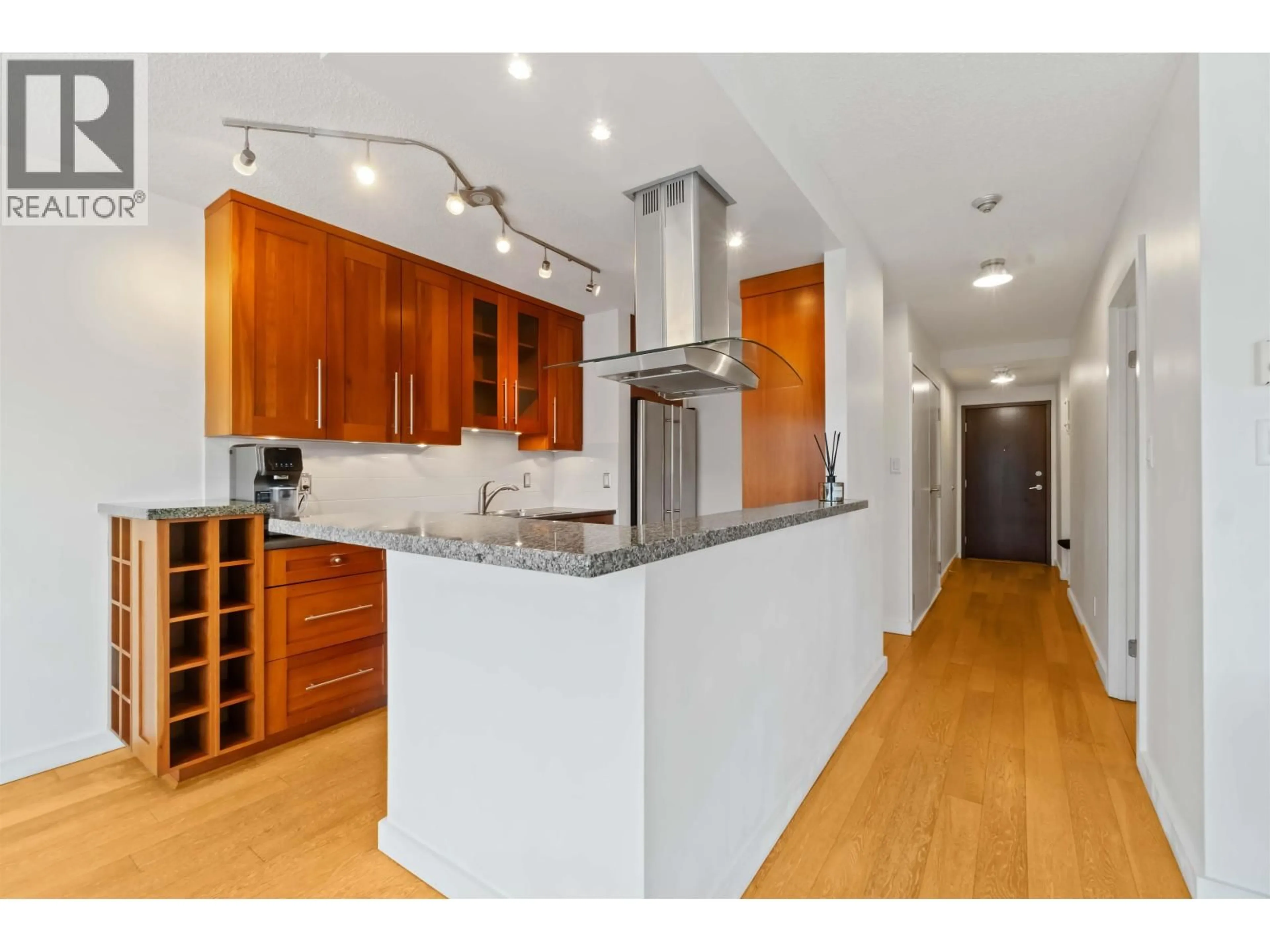 Open concept kitchen, wood/laminate floor for 406 - 1510 1ST AVENUE, Vancouver British Columbia V6J4S3