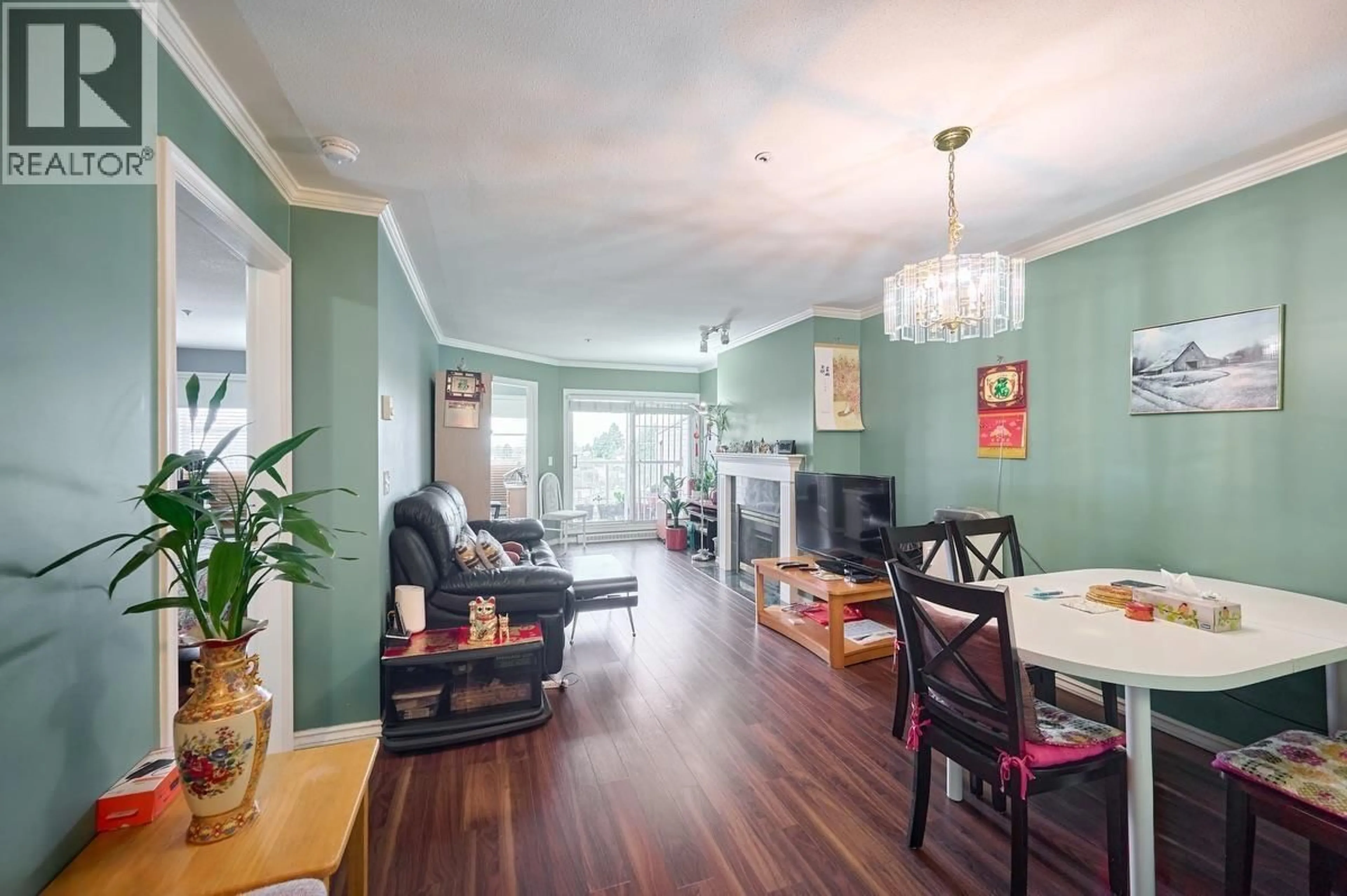 Dining room, wood/laminate floor for 406 - 1958 47TH AVENUE, Vancouver British Columbia V5P3X5
