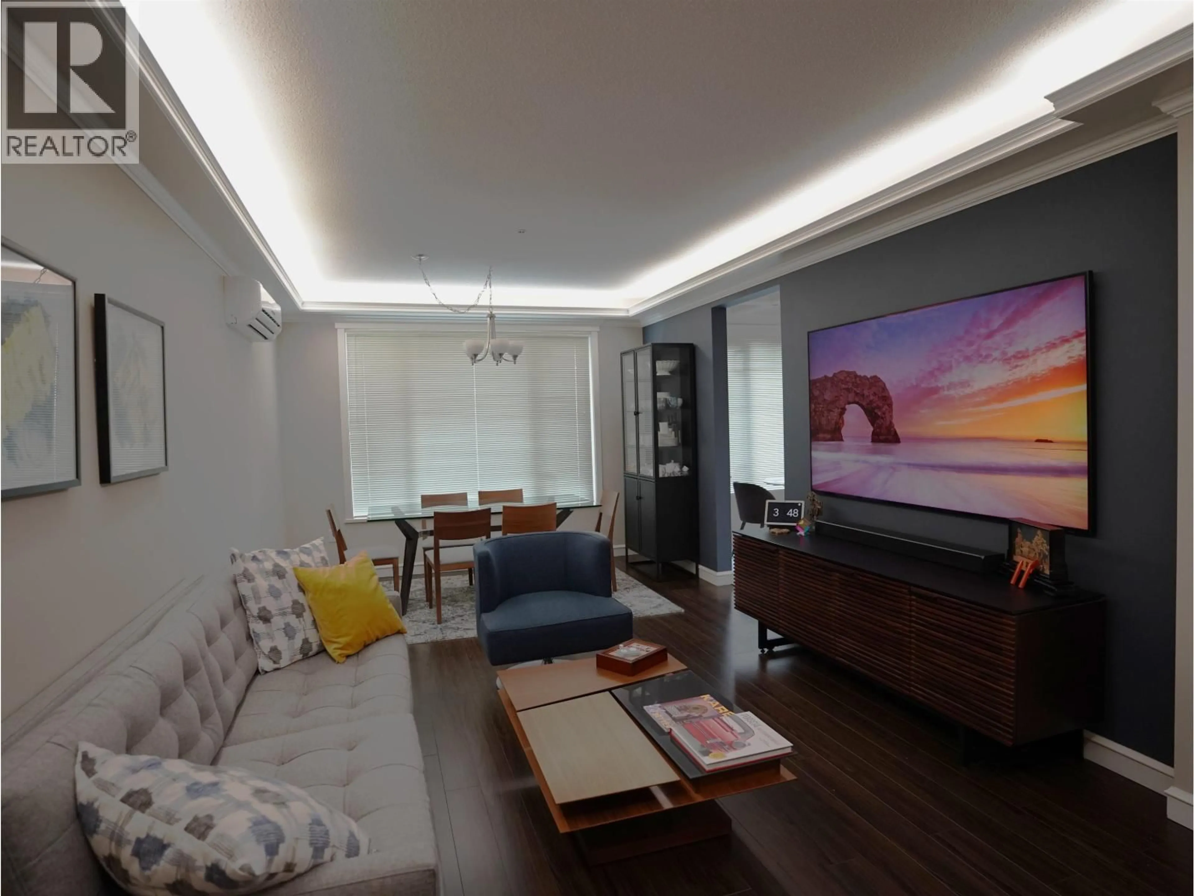 Living room with furniture, wood/laminate floor for 117 - 9388 MCKIM WAY, Richmond British Columbia V6X0J7