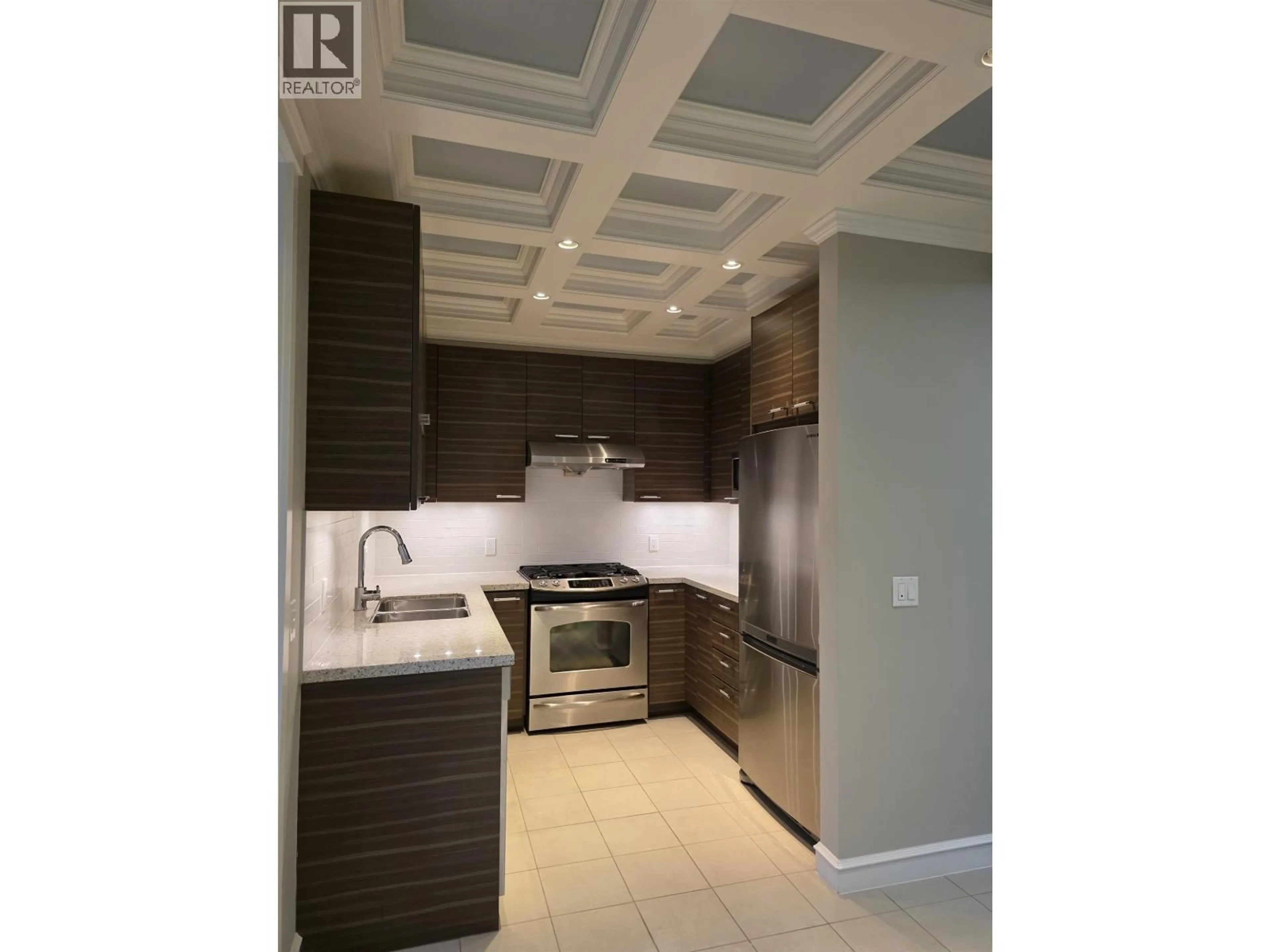 Open concept kitchen, ceramic/tile floor for 117 - 9388 MCKIM WAY, Richmond British Columbia V6X0J7