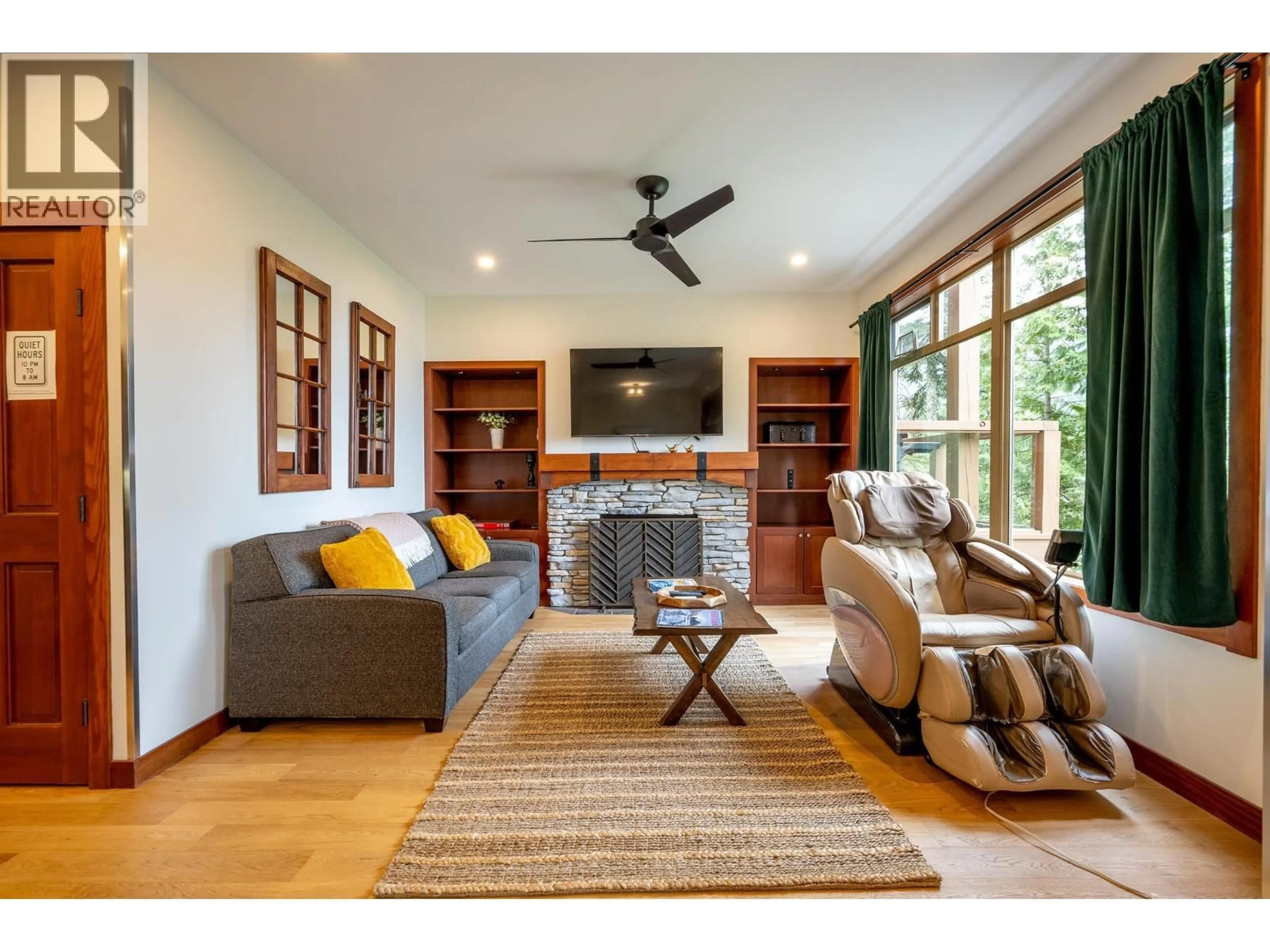 Living room with furniture, wood/laminate floor for 4 - 2301 TALUSWOOD PLACE, Whistler British Columbia V8E0P8