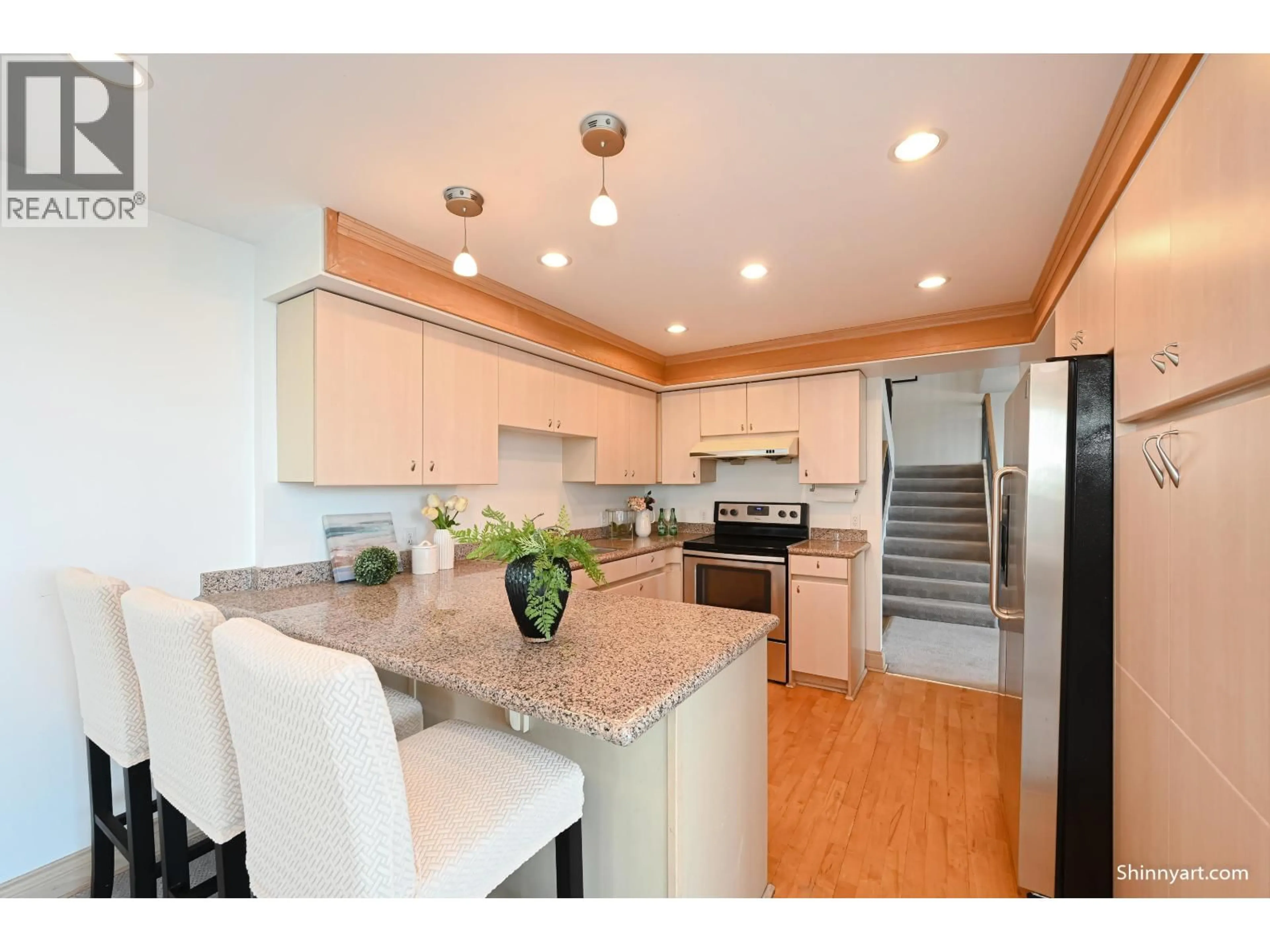 Open concept kitchen, wood/laminate floor for PH1604 - 8811 LANSDOWNE ROAD, Richmond British Columbia V6X3T4