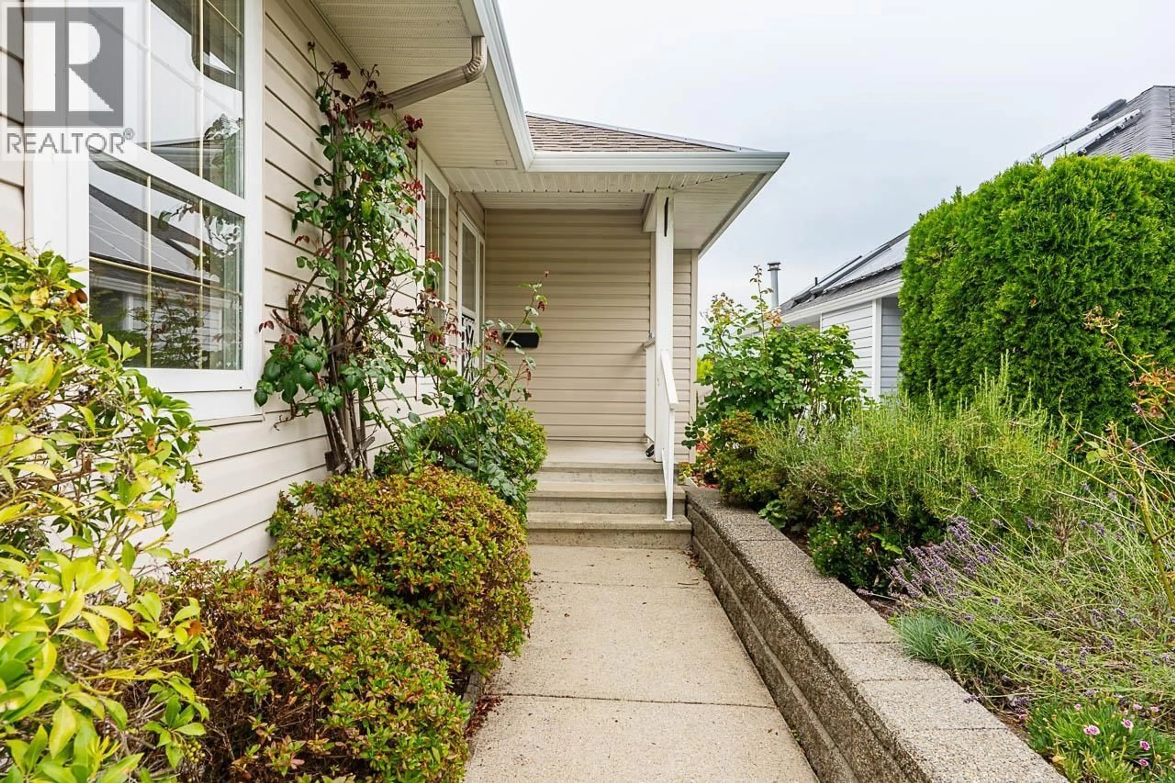 Home with vinyl exterior material, street for 22081 124 AVENUE, Maple Ridge British Columbia V2X4J1