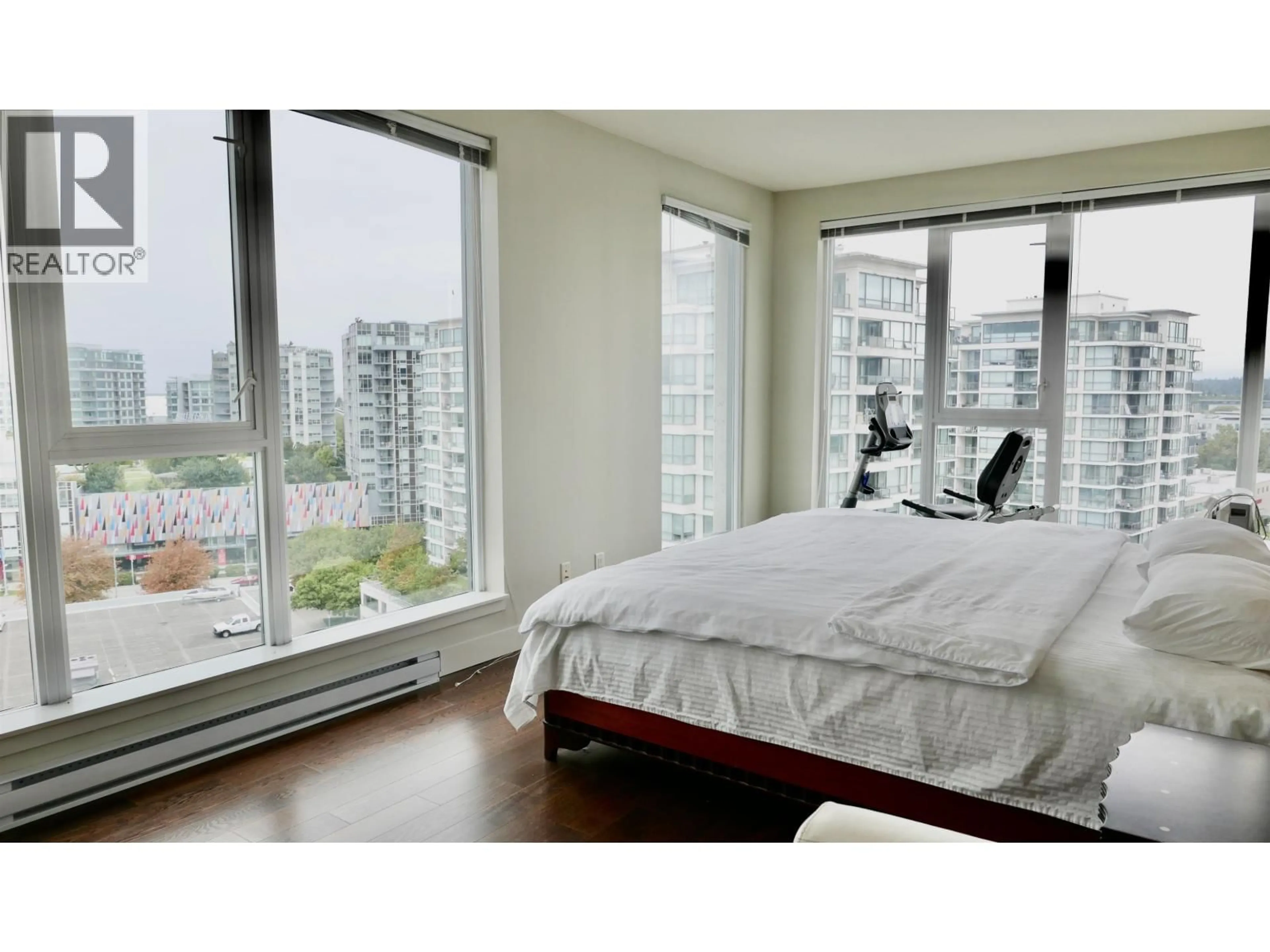 Bedroom with bed, wood/laminate floor for 1503 - 7117 ELMBRIDGE WAY, Richmond British Columbia V6X0J2