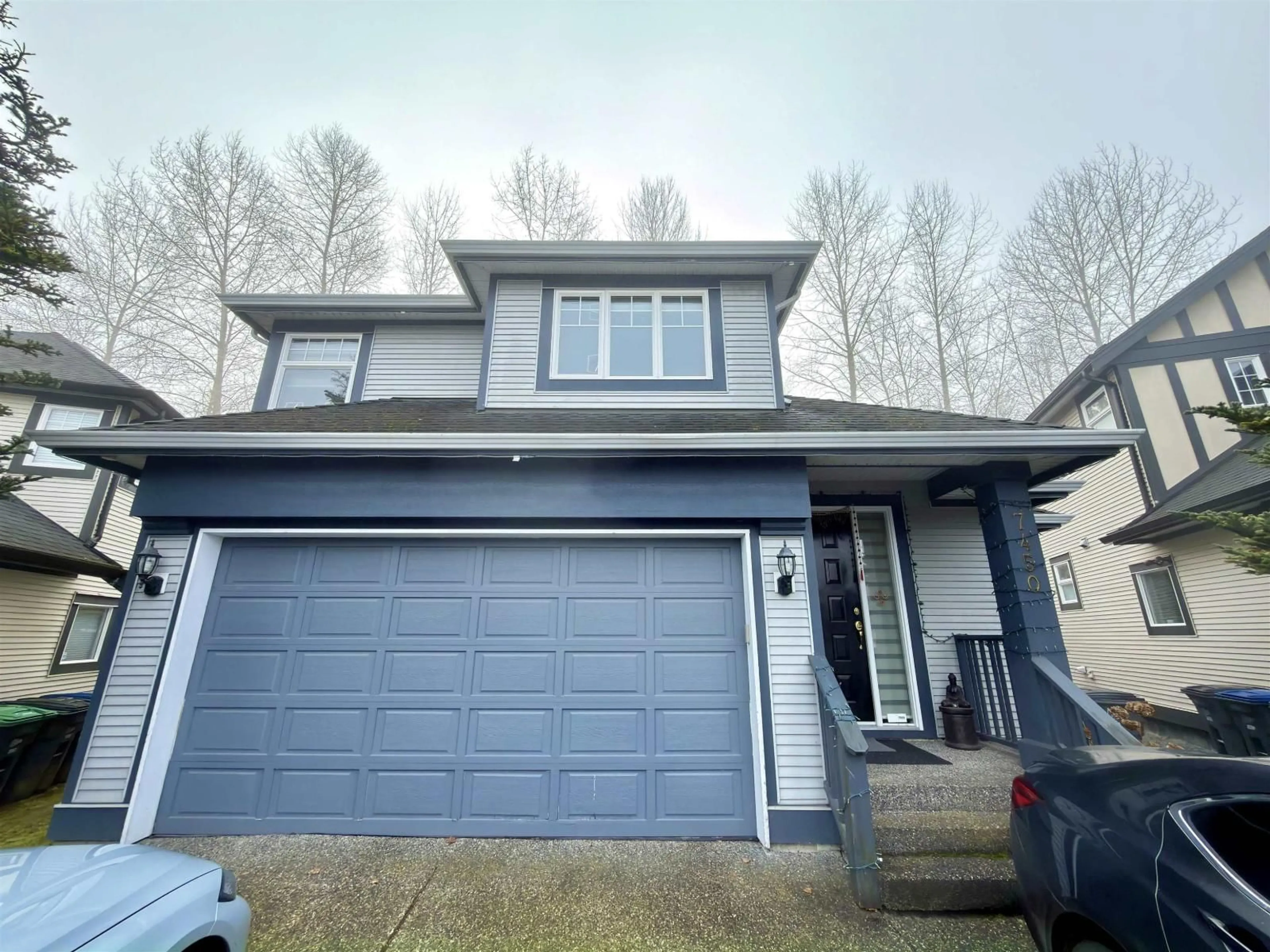 Home with vinyl exterior material, street for 7450 147 STREET, Surrey British Columbia V3S8Y7