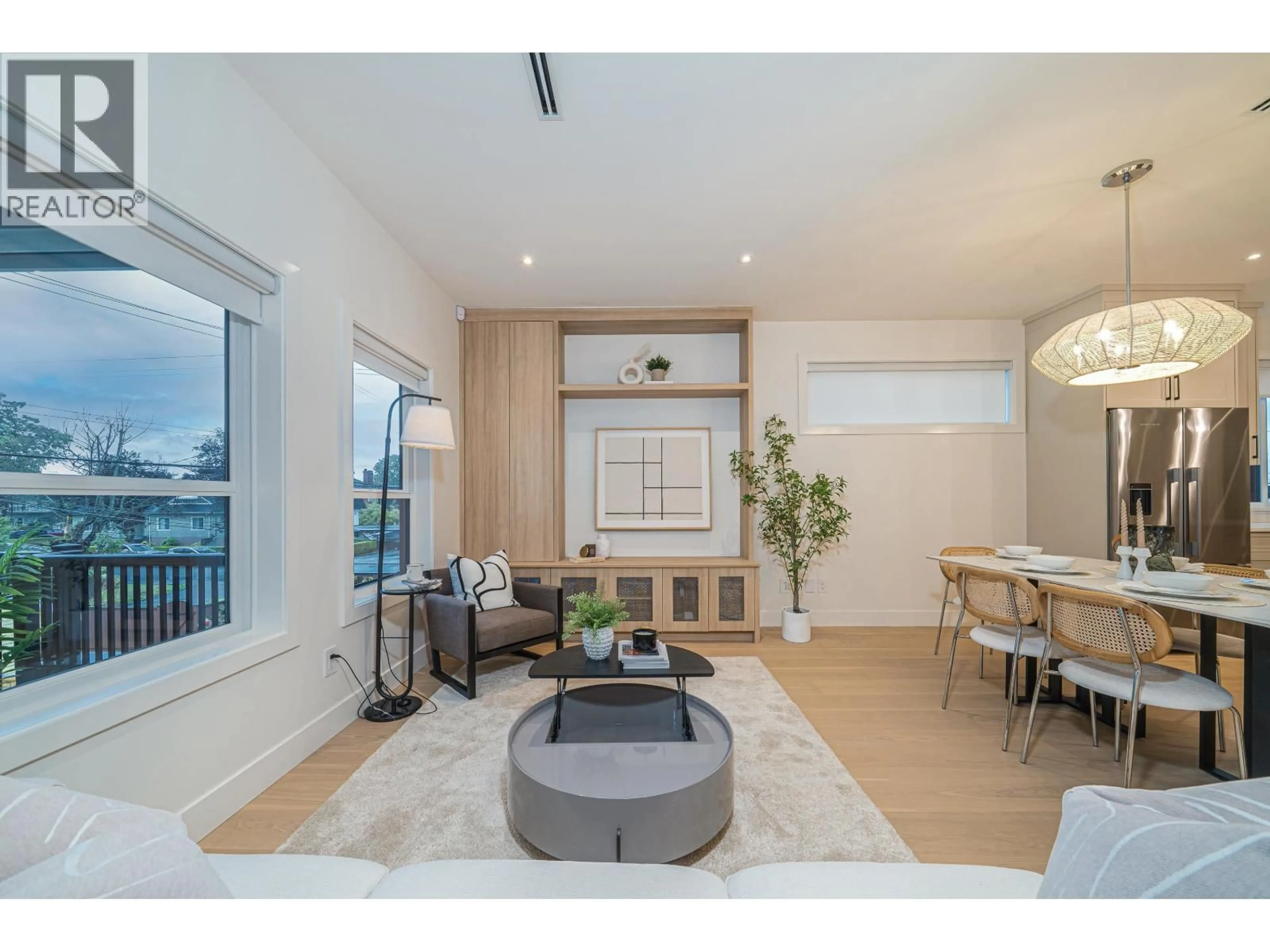 Living room with furniture, wood/laminate floor for 3817 OXFORD STREET, Burnaby British Columbia V5C1C2