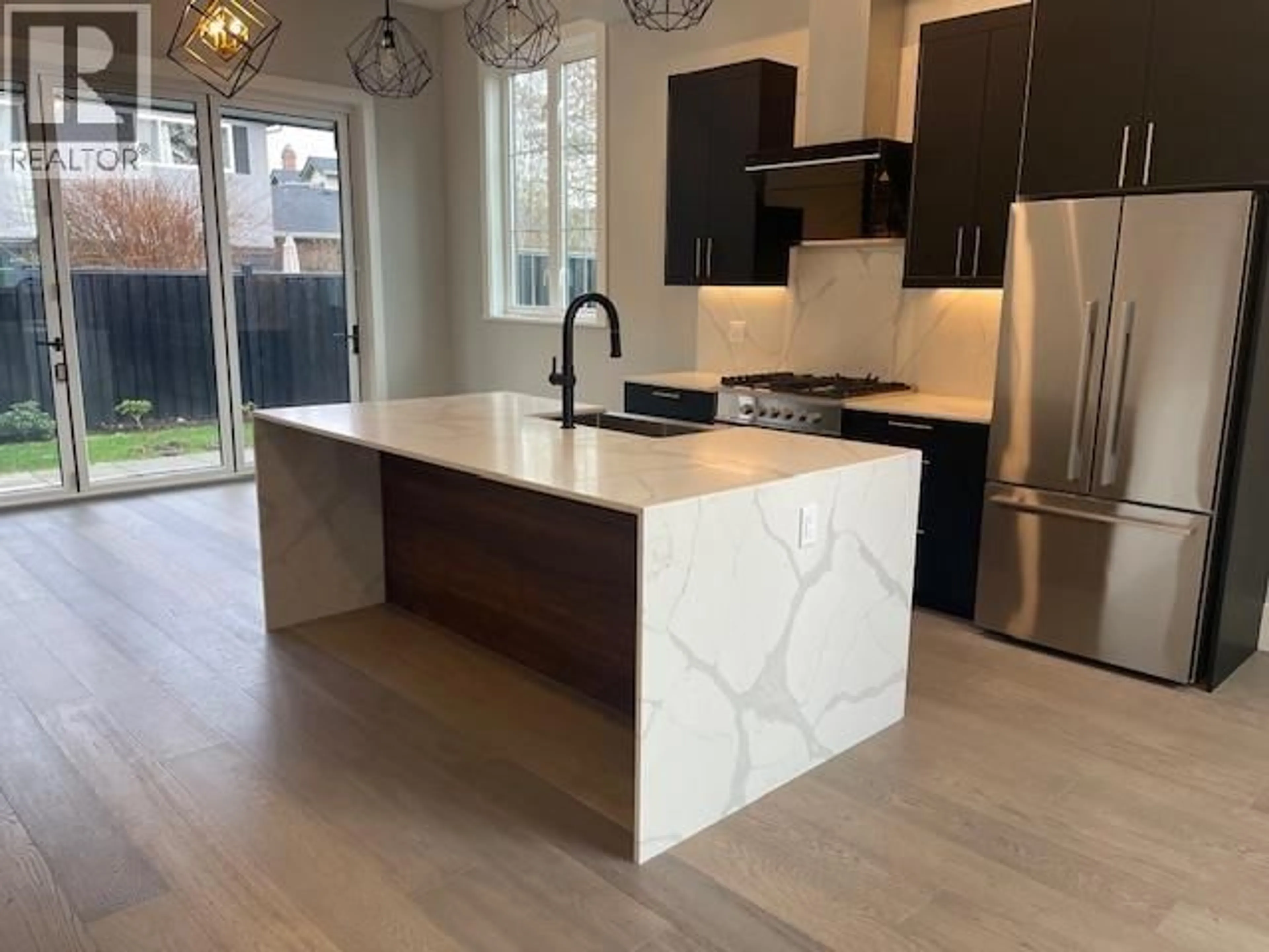 Open concept kitchen, ceramic/tile floor for 4 - 9500 GARDEN CITY ROAD, Richmond British Columbia V7A2S2