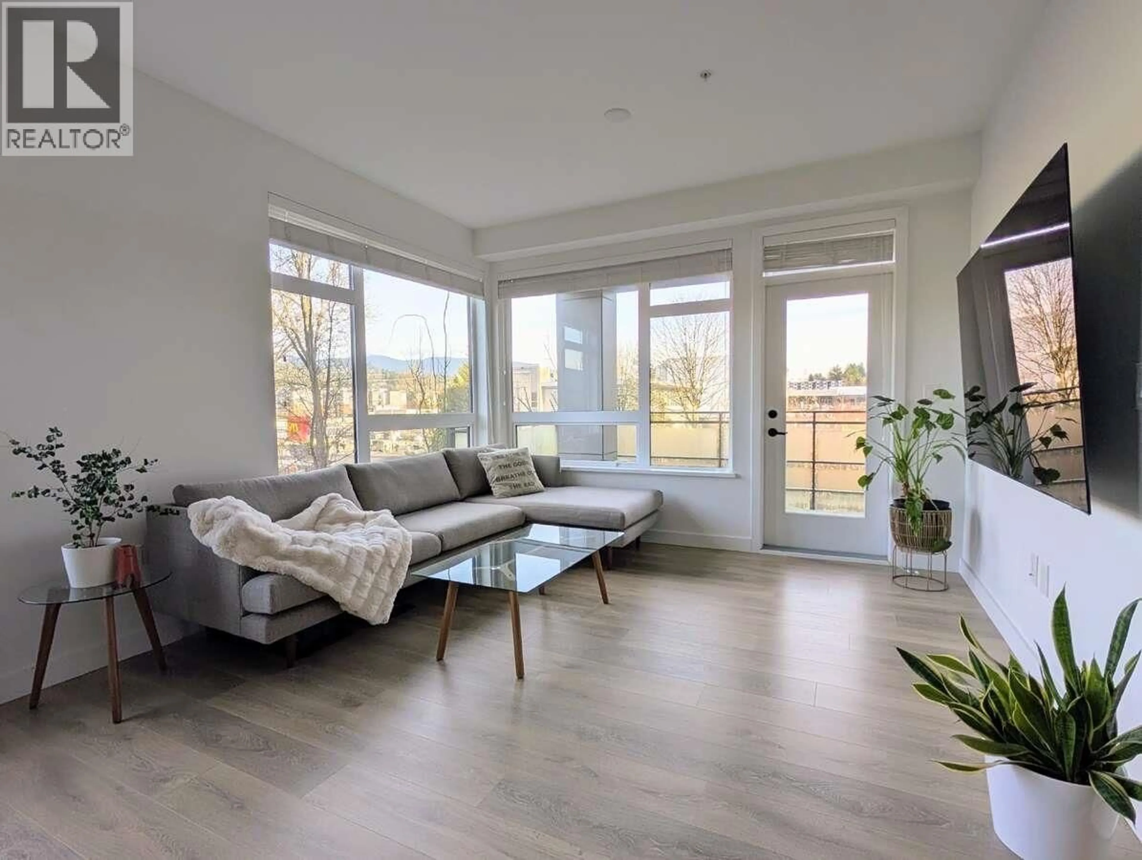 Living room with furniture, wood/laminate floor for 316 - 3038 ST GEORGE STREET, Port Moody British Columbia V3H0L3