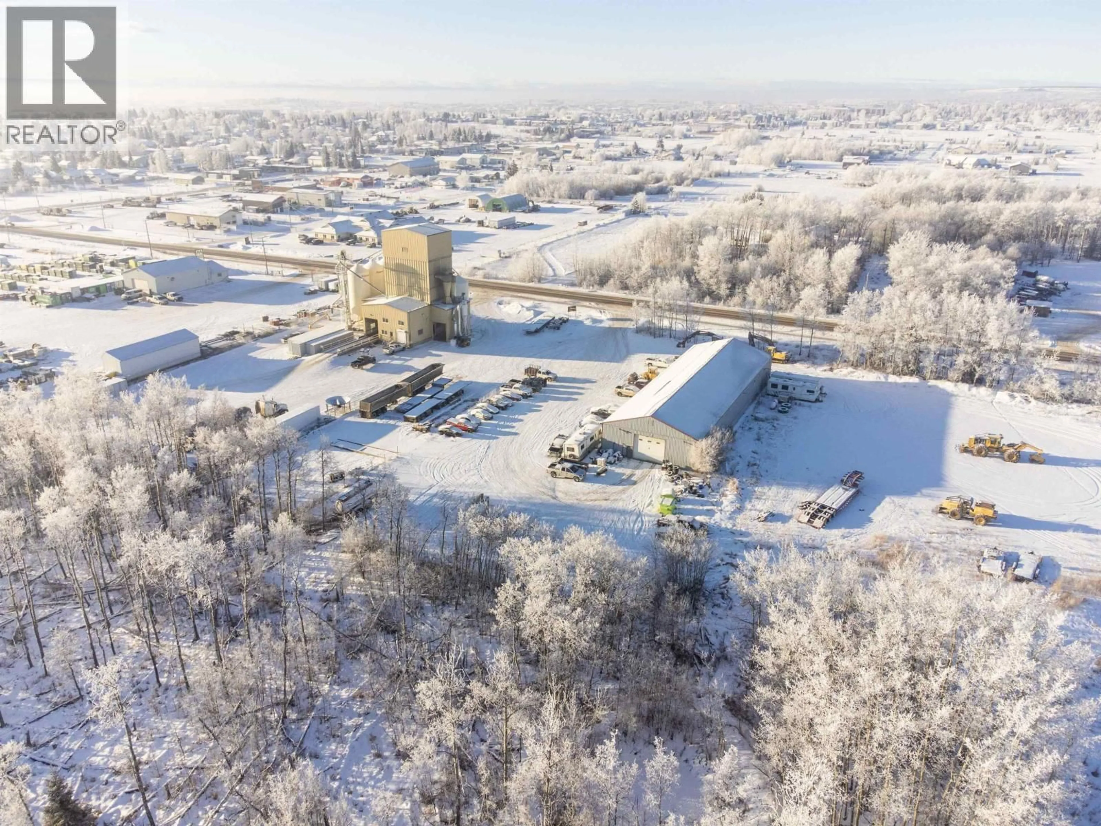 A pic from outside/outdoor area/front of a property/back of a property/a pic from drone, building for 10727 NORTHERN LIGHTS DRIVE, Fort St. John British Columbia V1J0S8