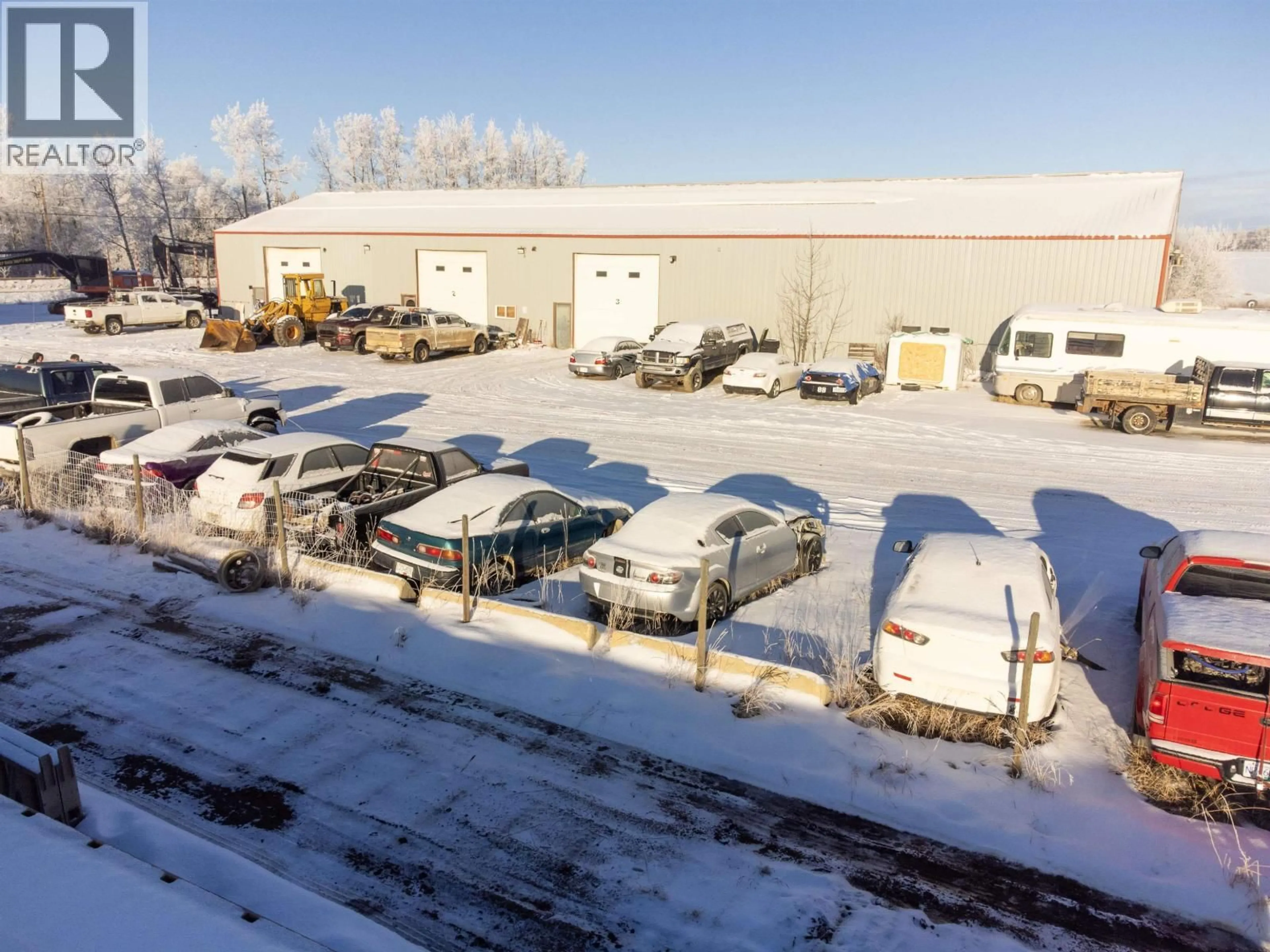 A pic from outside/outdoor area/front of a property/back of a property/a pic from drone, building for 10727 NORTHERN LIGHTS DRIVE, Fort St. John British Columbia V1J0S8