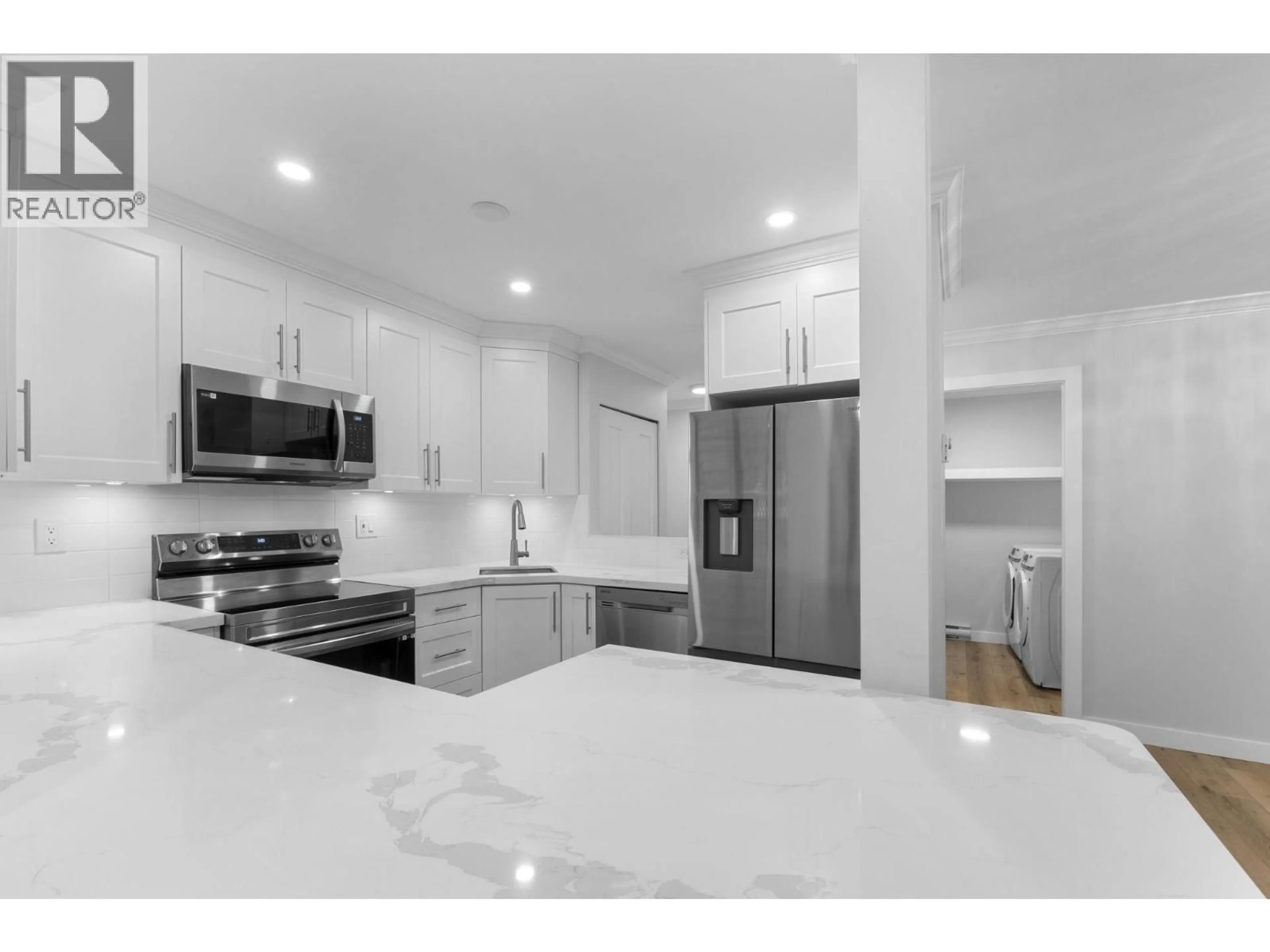 Open concept kitchen, unknown for 102 - 9152 SATURNA DRIVE, Burnaby British Columbia V3J7K2