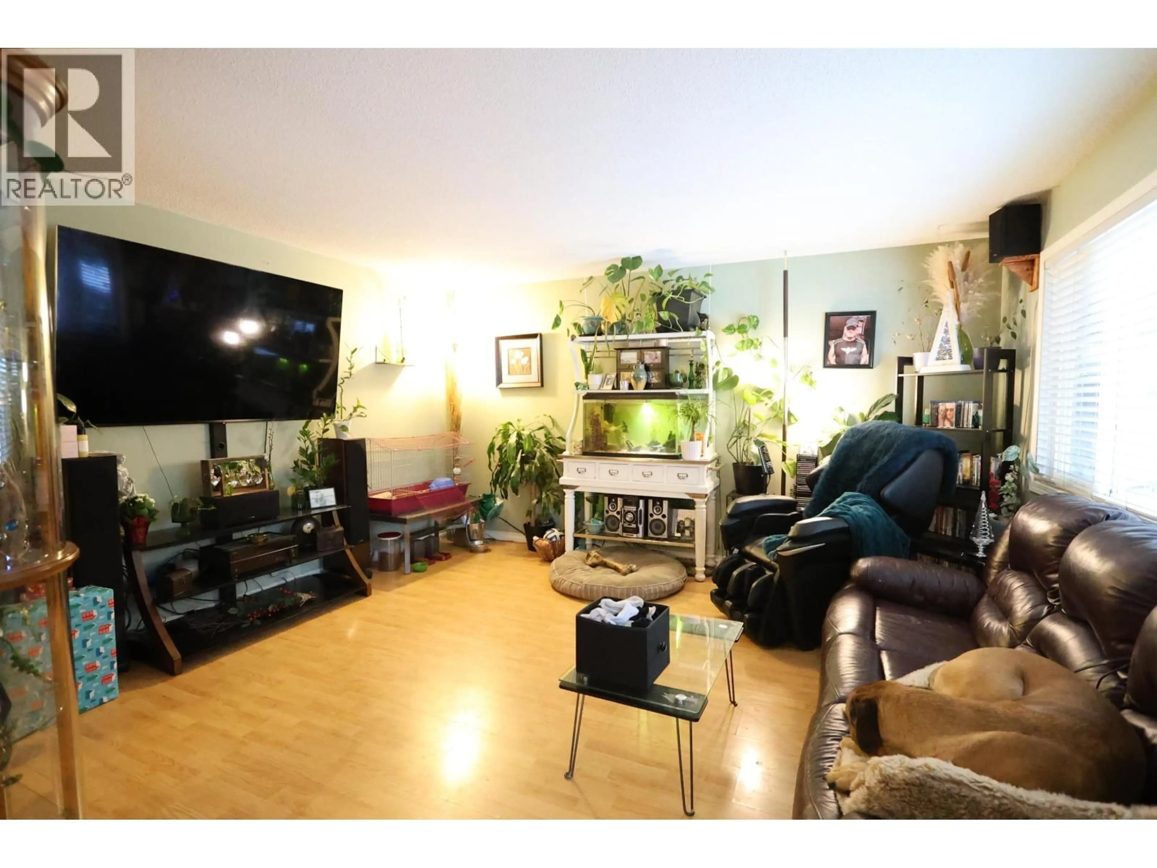 Living room with furniture, wood/laminate floor for 6015 SELKIRK CRESCENT, Prince George British Columbia V2N2G9