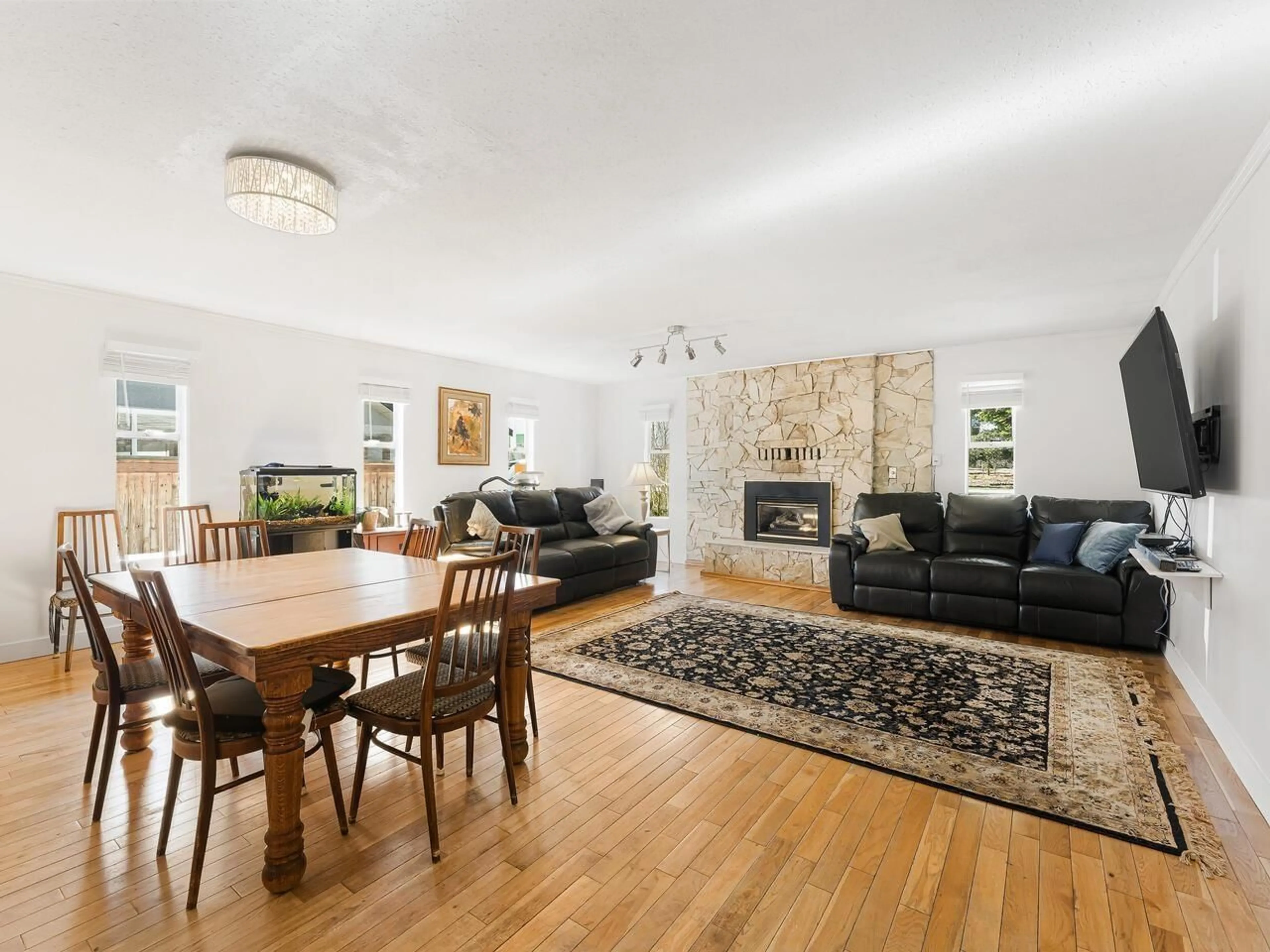 Living room with furniture, wood/laminate floor for 3538 196 STREET, Langley British Columbia V3A4T7