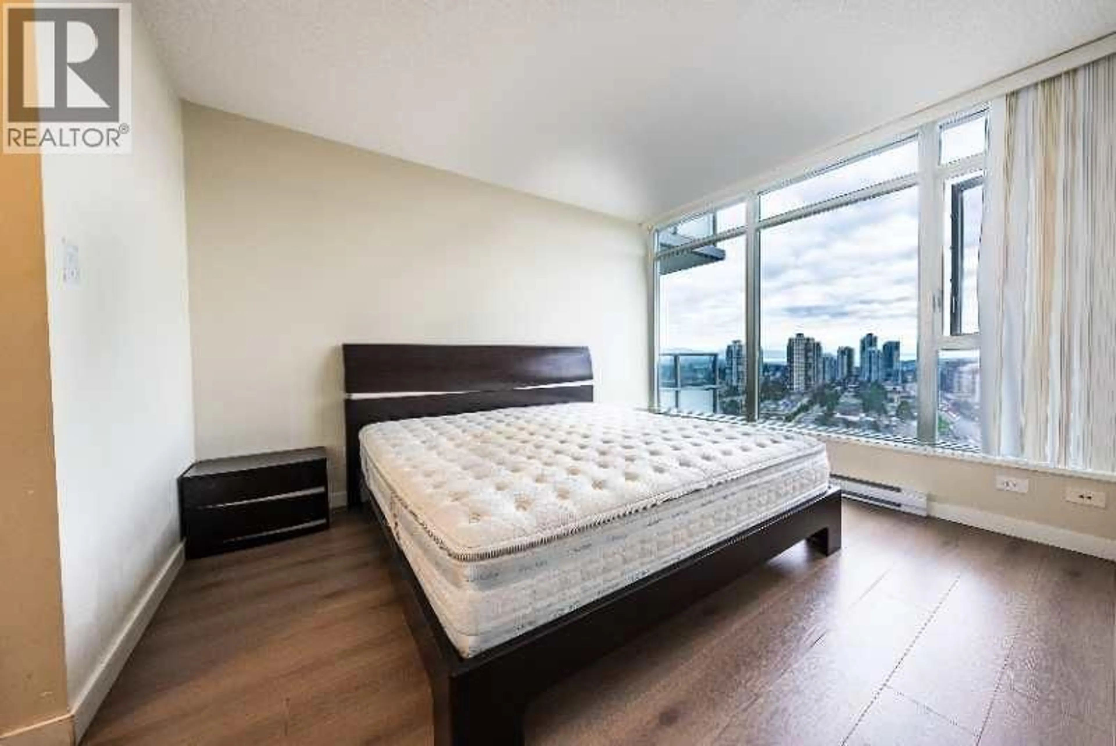 Bedroom with bed, wood/laminate floor for 2205 - 6688 ARCOLA STREET, Burnaby British Columbia V5E0B3