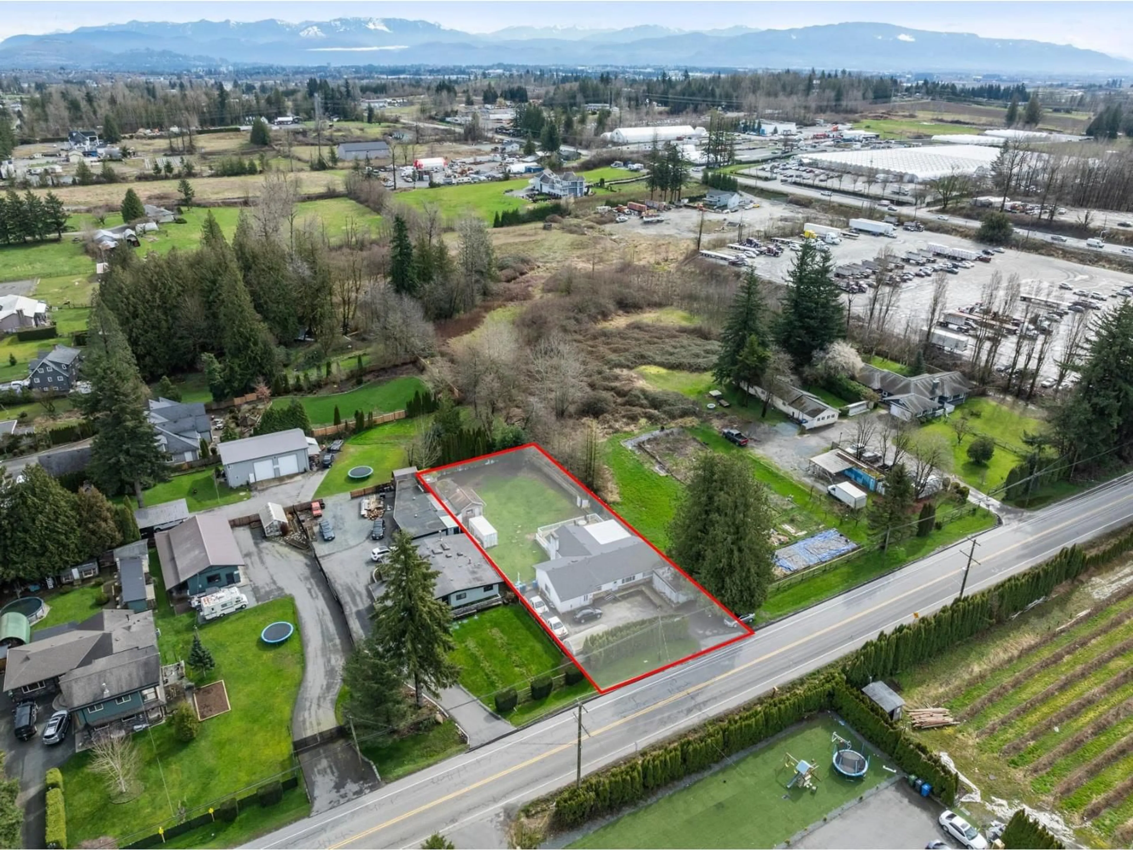 A pic from outside/outdoor area/front of a property/back of a property/a pic from drone, mountain view for 3132 BRADNER ROAD, Abbotsford British Columbia V4X1K2
