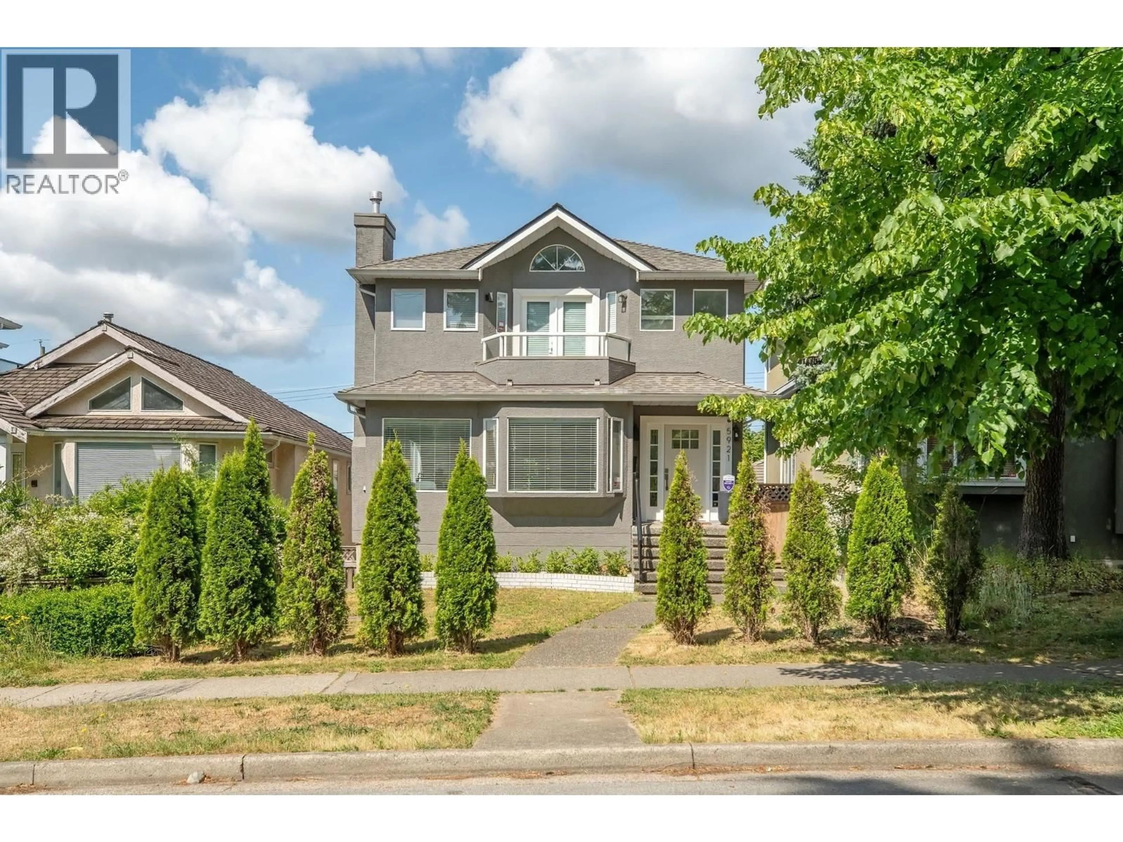Home with vinyl exterior material, street for 5921 ONTARIO STREET, Vancouver British Columbia V5W2M1