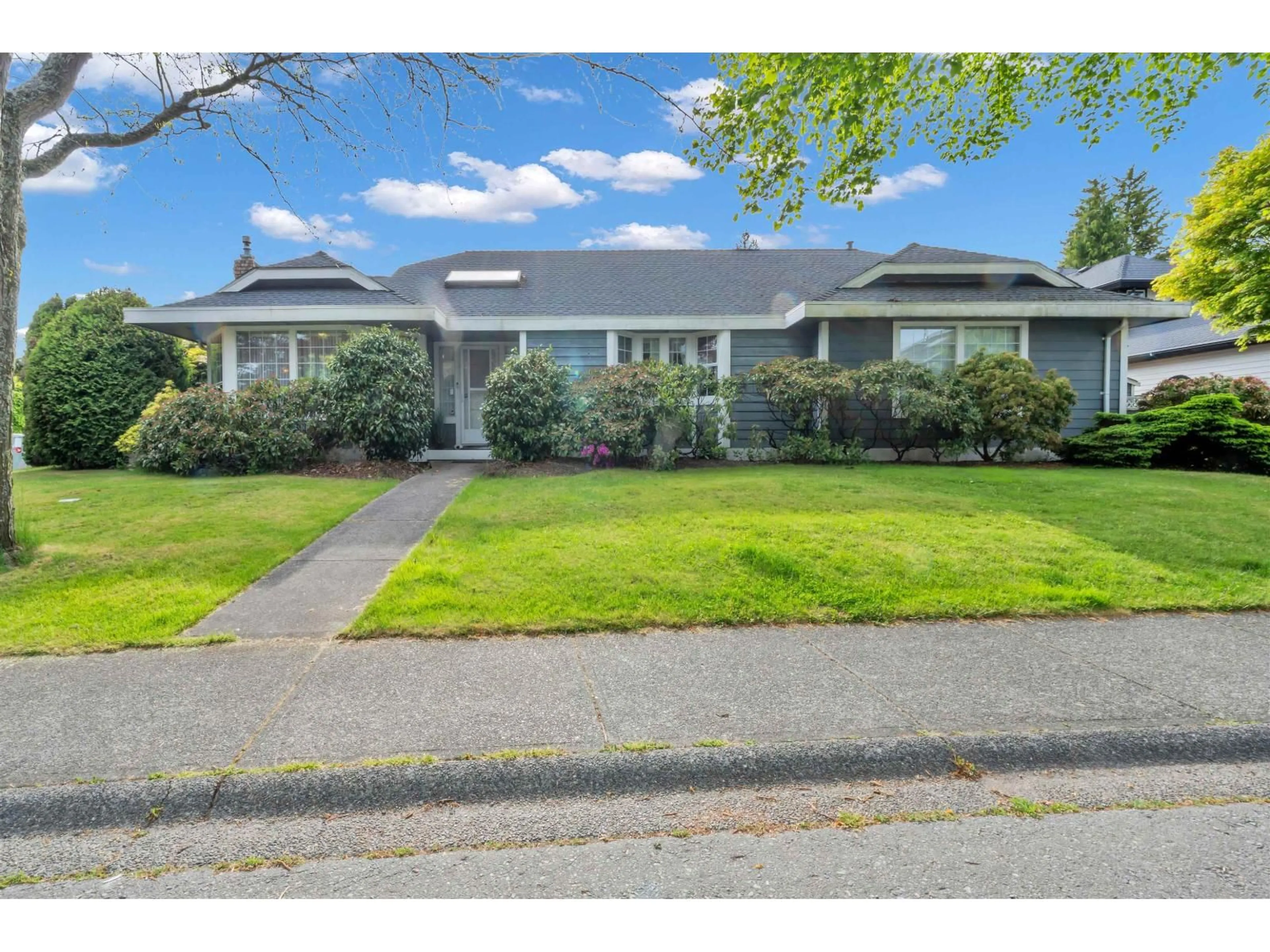 Home with vinyl exterior material, street for 2151 148A STREET, Surrey British Columbia V4A8L7