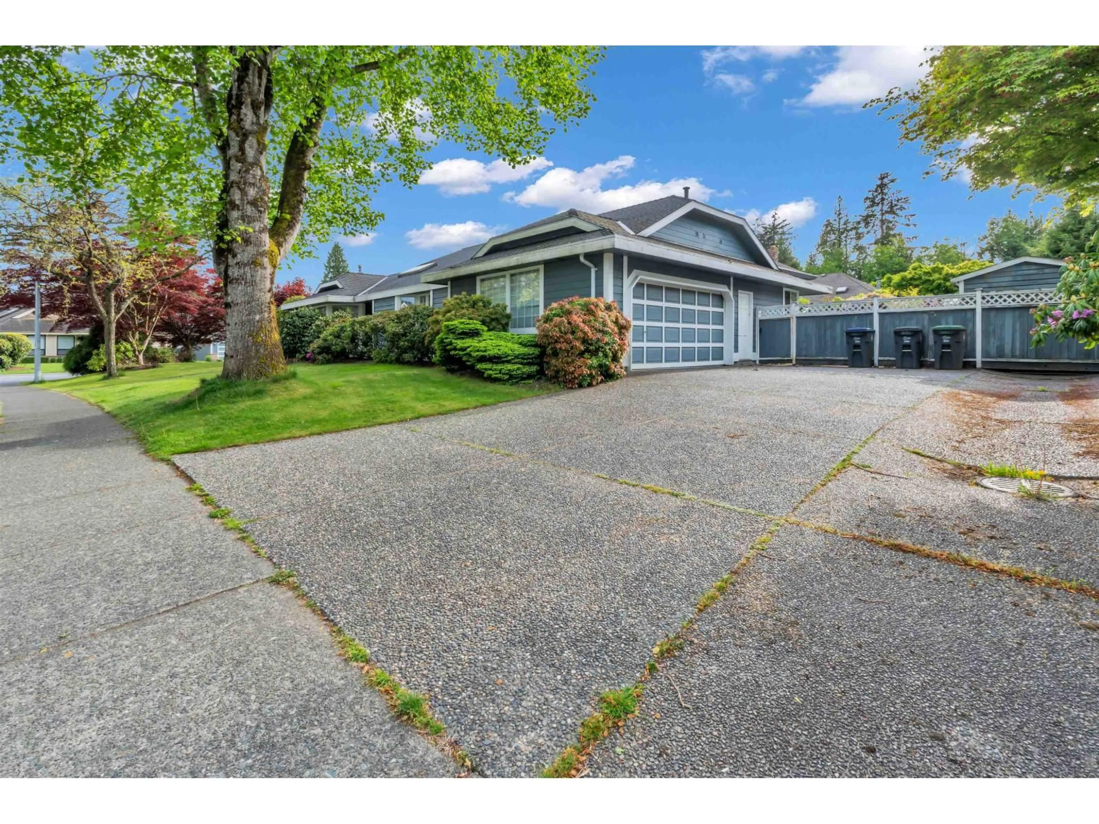 Home with vinyl exterior material, street for 2151 148A STREET, Surrey British Columbia V4A8L7