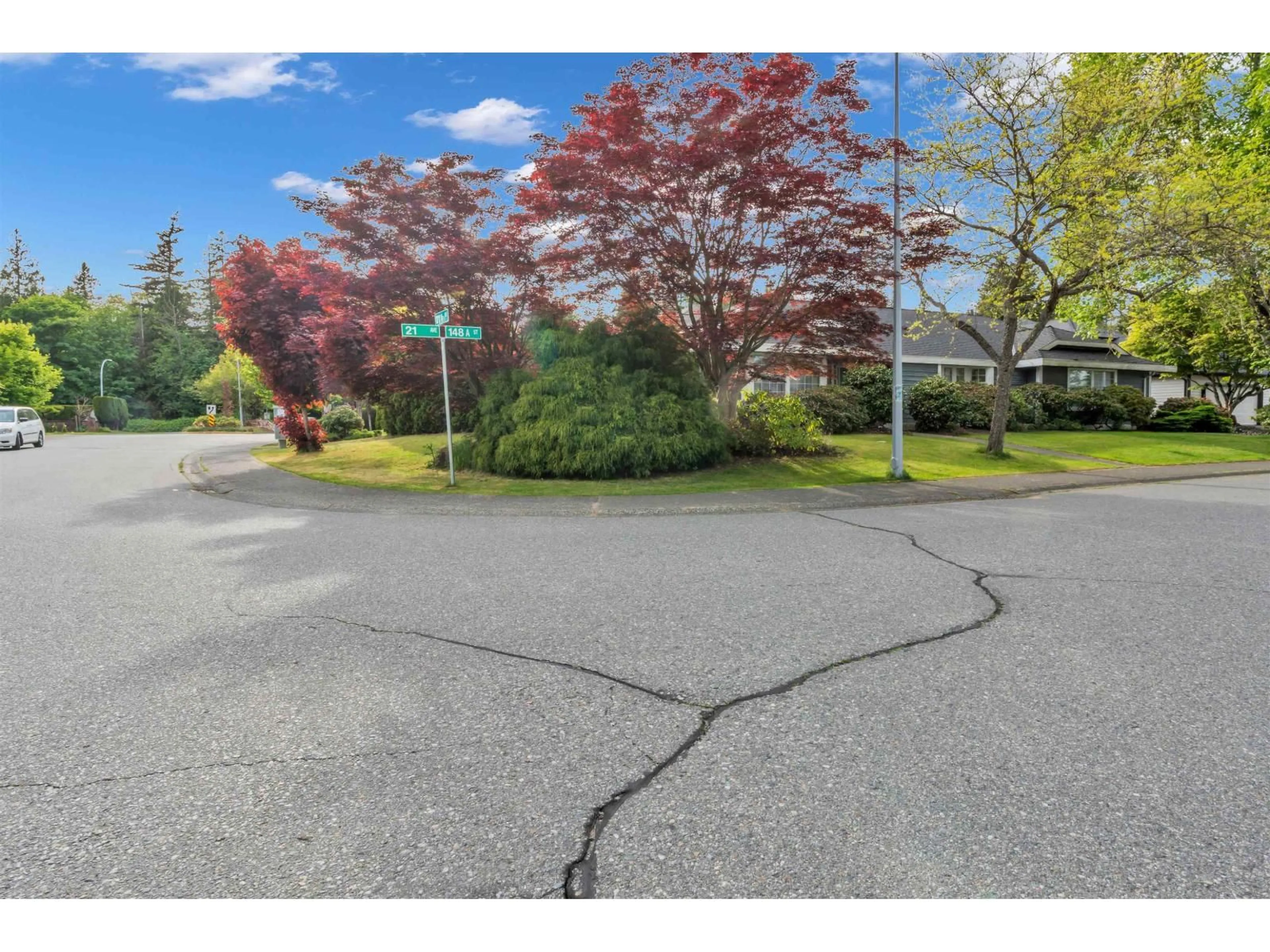 A pic from outside/outdoor area/front of a property/back of a property/a pic from drone, street for 2151 148A STREET, Surrey British Columbia V4A8L7