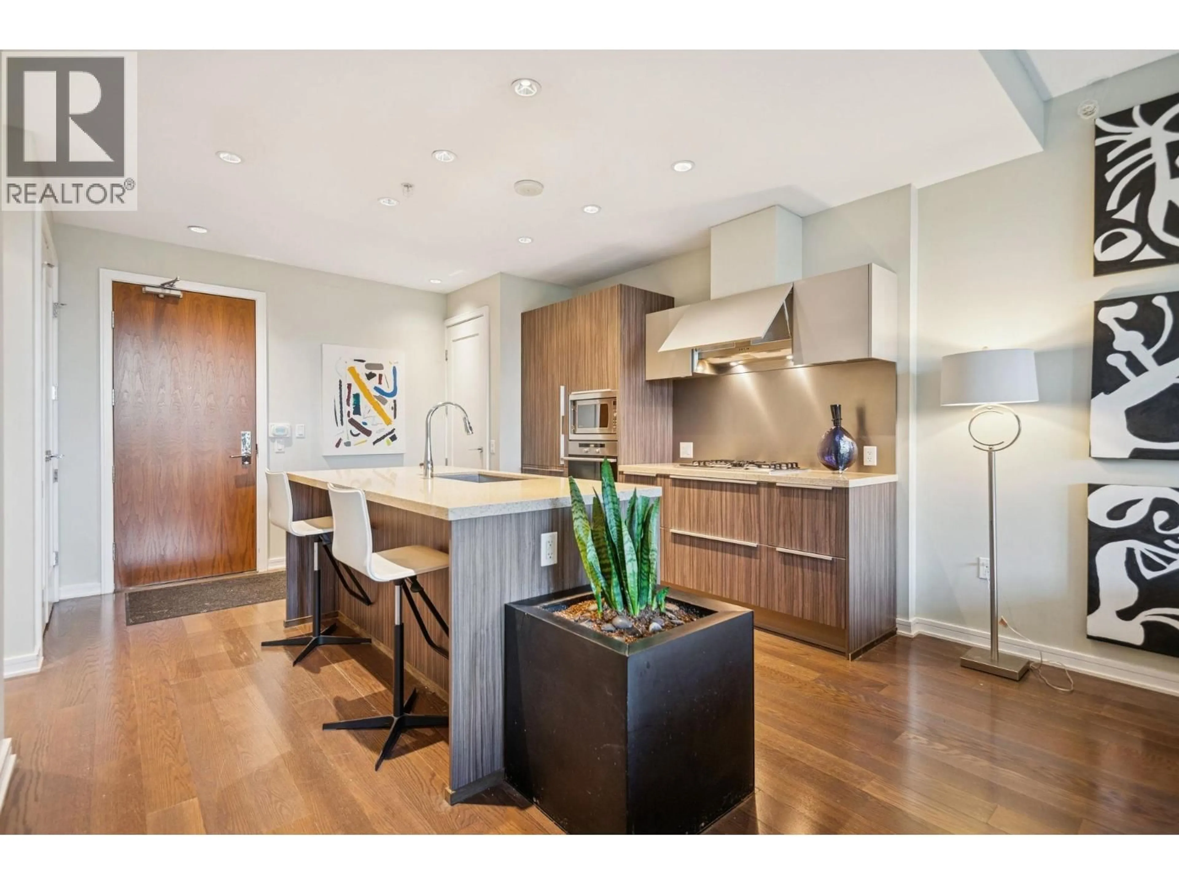 Open concept kitchen, wood/laminate floor for 1618 COLUMBIA STREET, Vancouver British Columbia V5Y0B6