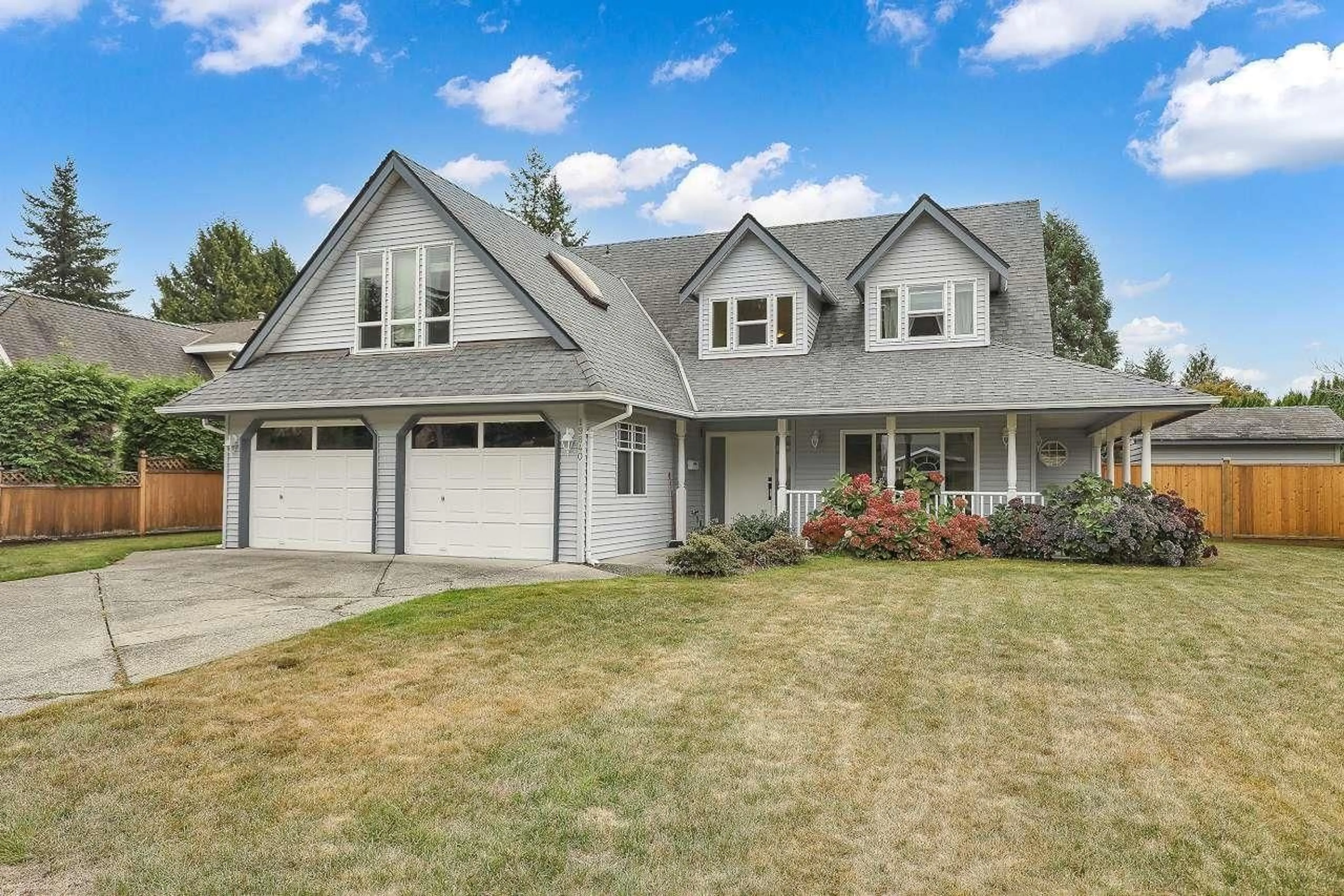 Home with vinyl exterior material, street for 19840 34A AVENUE, Langley British Columbia V3A7W7