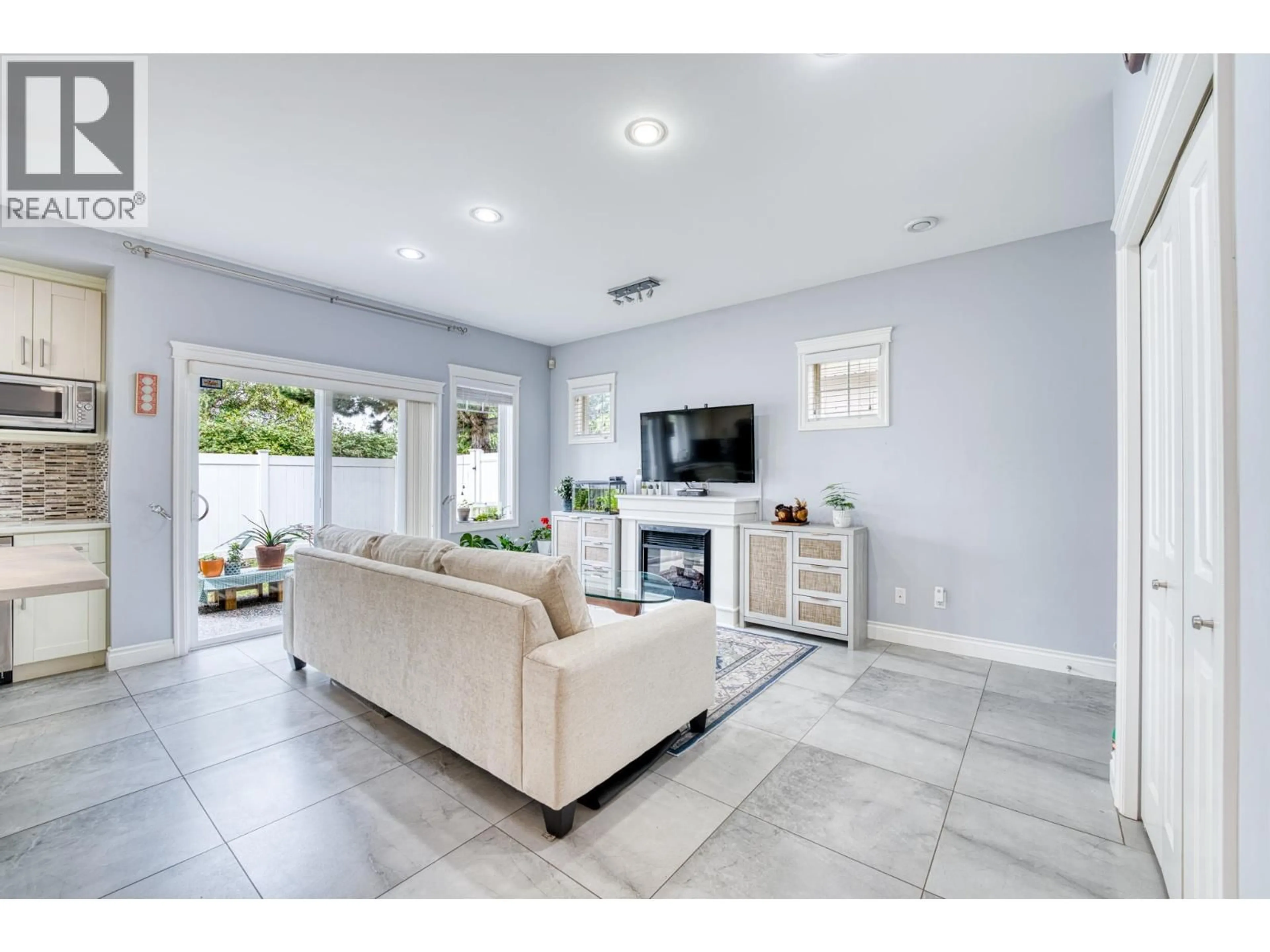 Living room with furniture, ceramic/tile floor for 30 - 11393 STEVESTON HIGHWAY, Richmond British Columbia V7A1N8