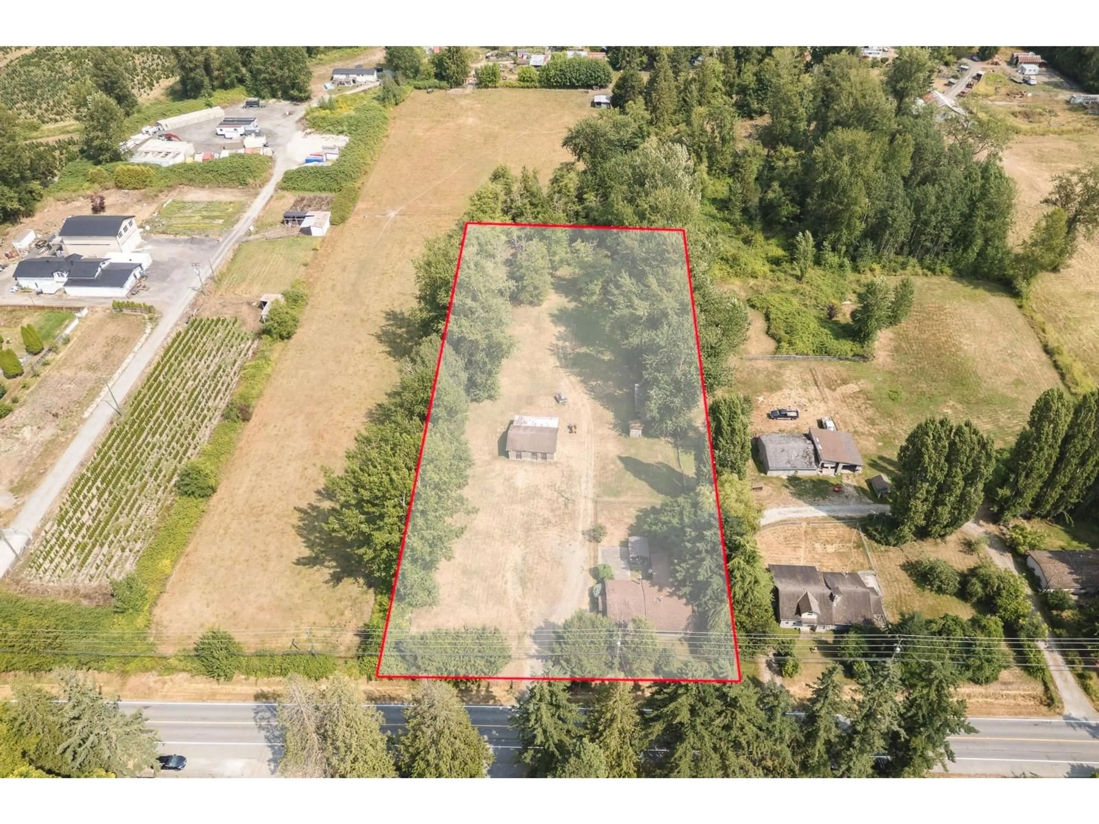 A pic from outside/outdoor area/front of a property/back of a property/a pic from drone, building for 2708 208 STREET, Langley British Columbia V2Z2B1