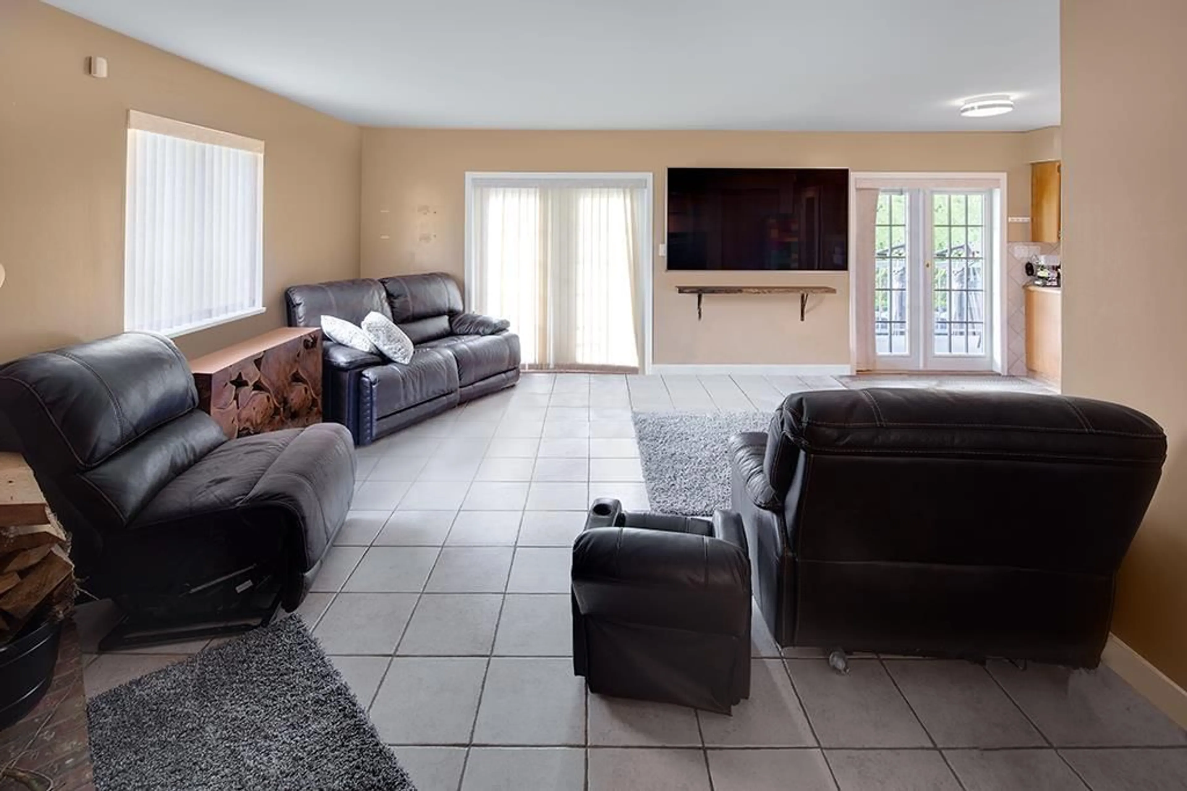 Living room with furniture, ceramic/tile floor for 18851 74 AVENUE, Surrey British Columbia V4N6C3