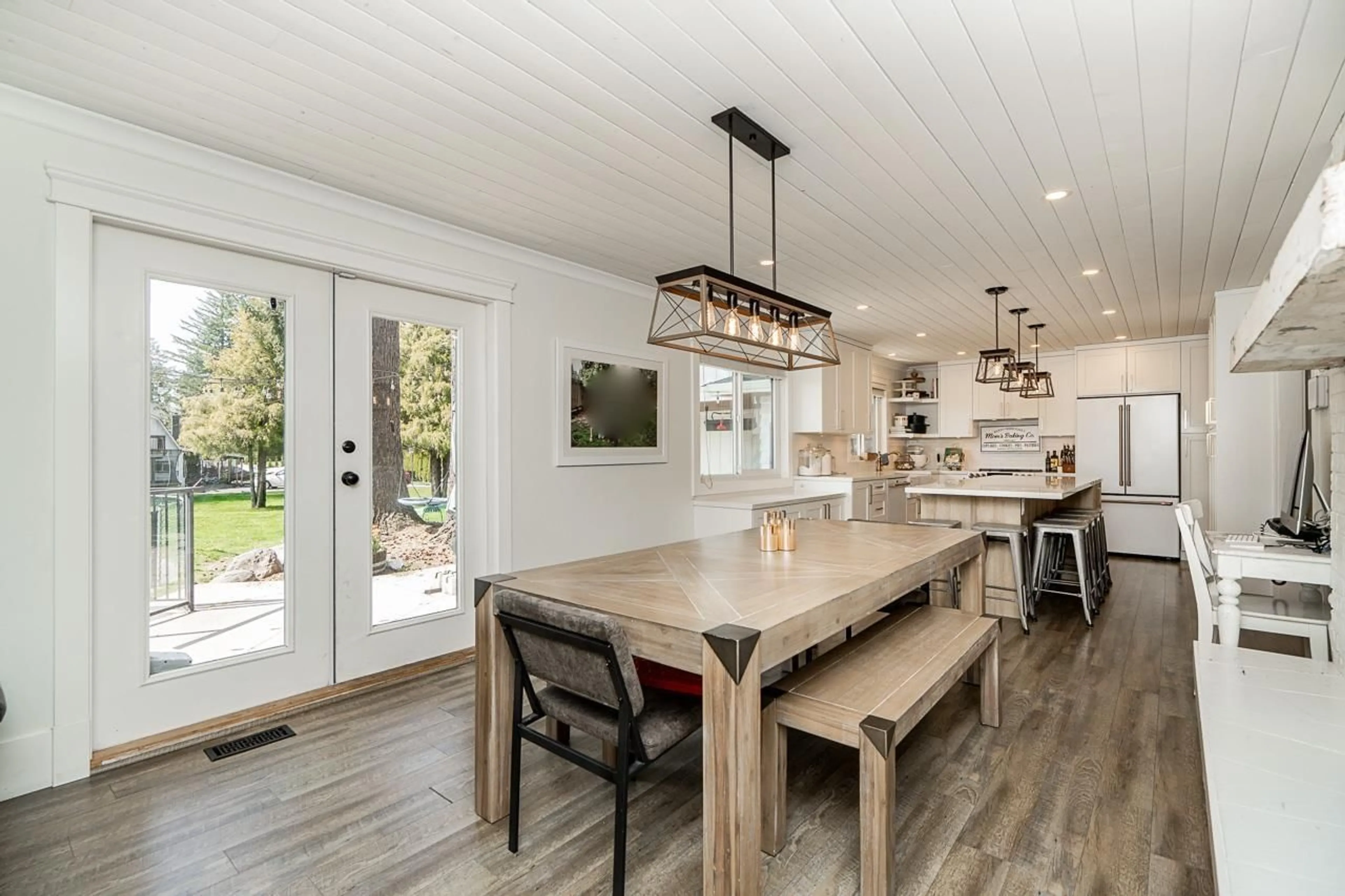 Open concept kitchen, wood/laminate floor for 4465 248 STREET, Langley British Columbia V4W1E1